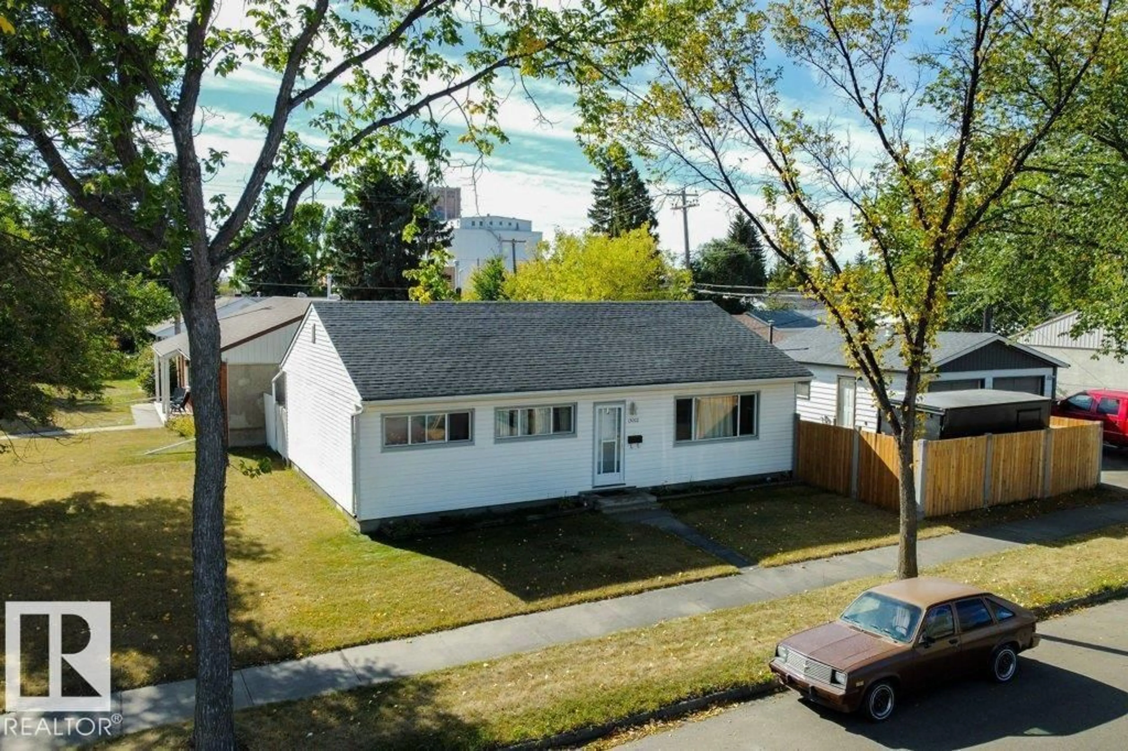 A pic from outside/outdoor area/front of a property/back of a property/a pic from drone, street for 13003 129 AV, Edmonton Alberta T5L3K1