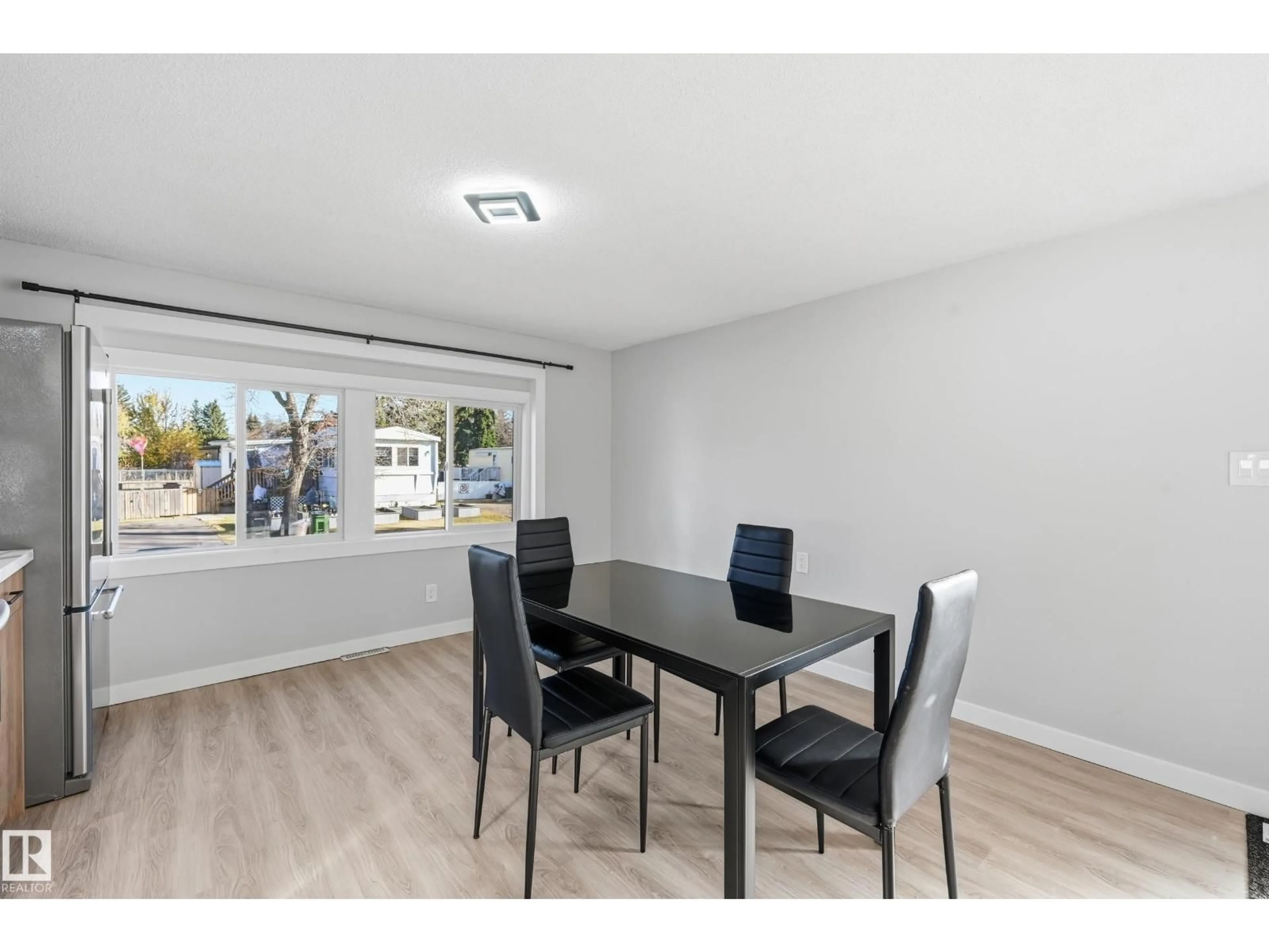 Dining room, wood/laminate floor for 2 CLIFF CR, Edmonton Alberta T6P1B6