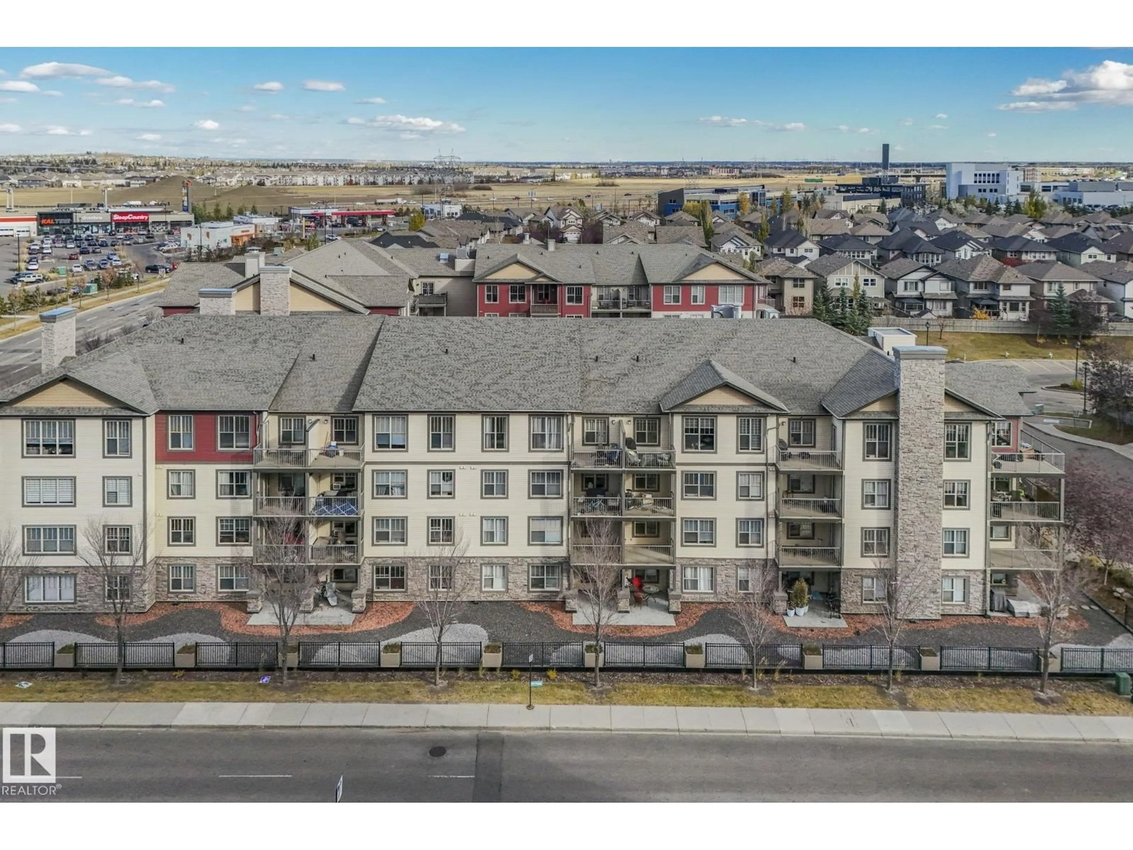 A pic from outside/outdoor area/front of a property/back of a property/a pic from drone, city buildings view from balcony for 103 - 210 AMBLESIDE DR, Edmonton Alberta T6W0J4