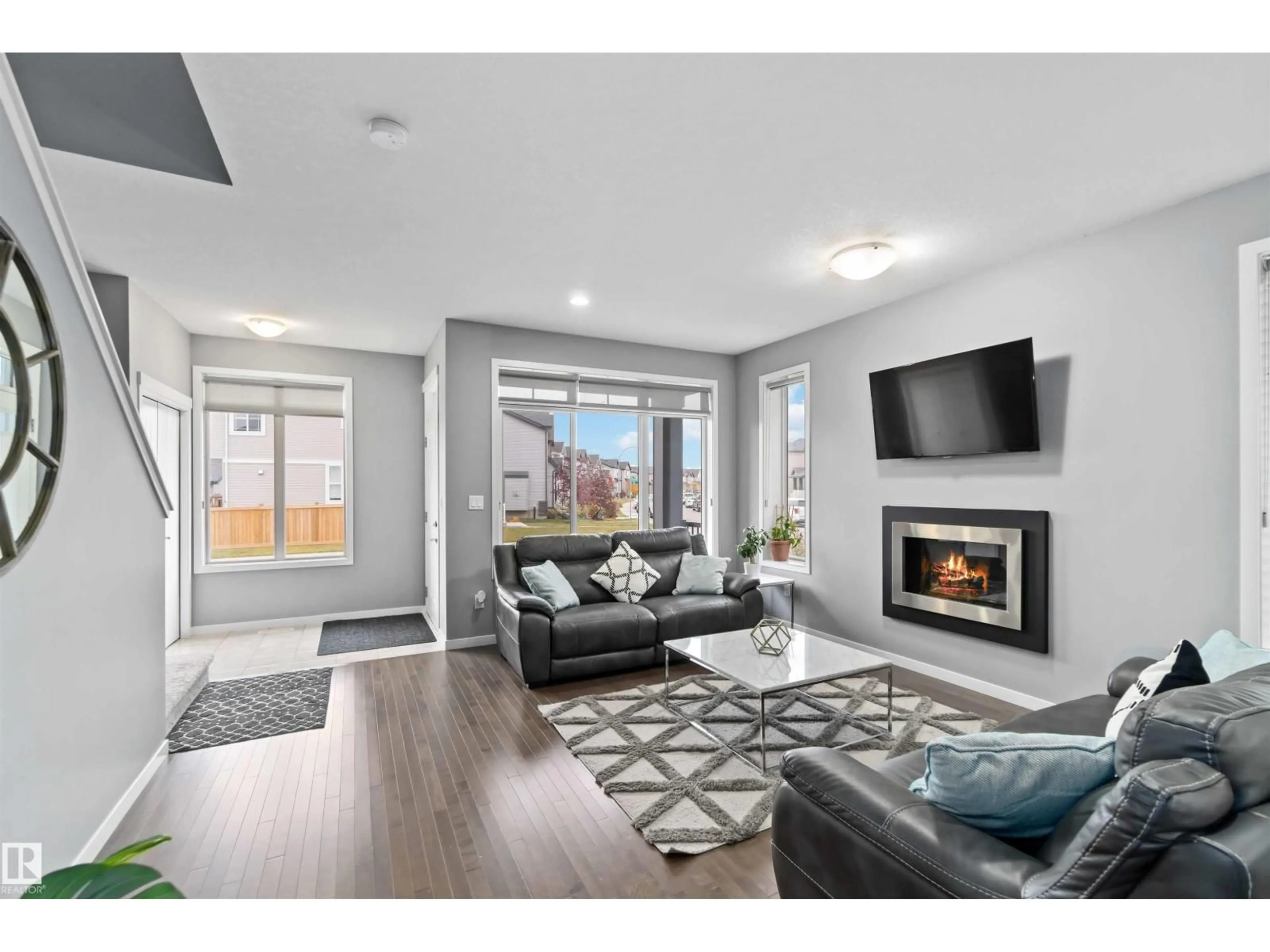 Living room with furniture, unknown for 17816 59 ST, Edmonton Alberta T5Y0W8