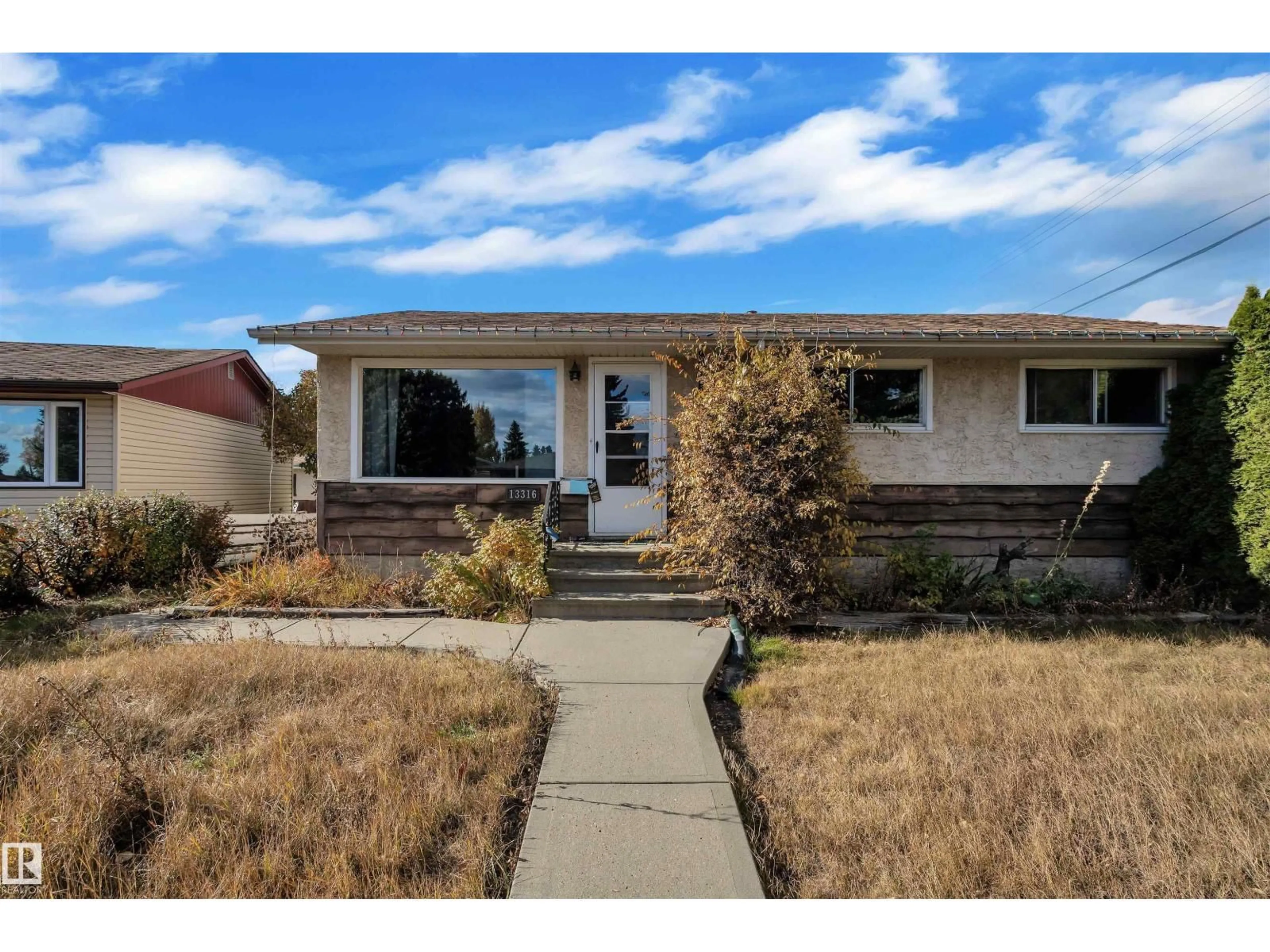 Home with vinyl exterior material, street for NW - 13316 139 ST, Edmonton Alberta T5L2C2