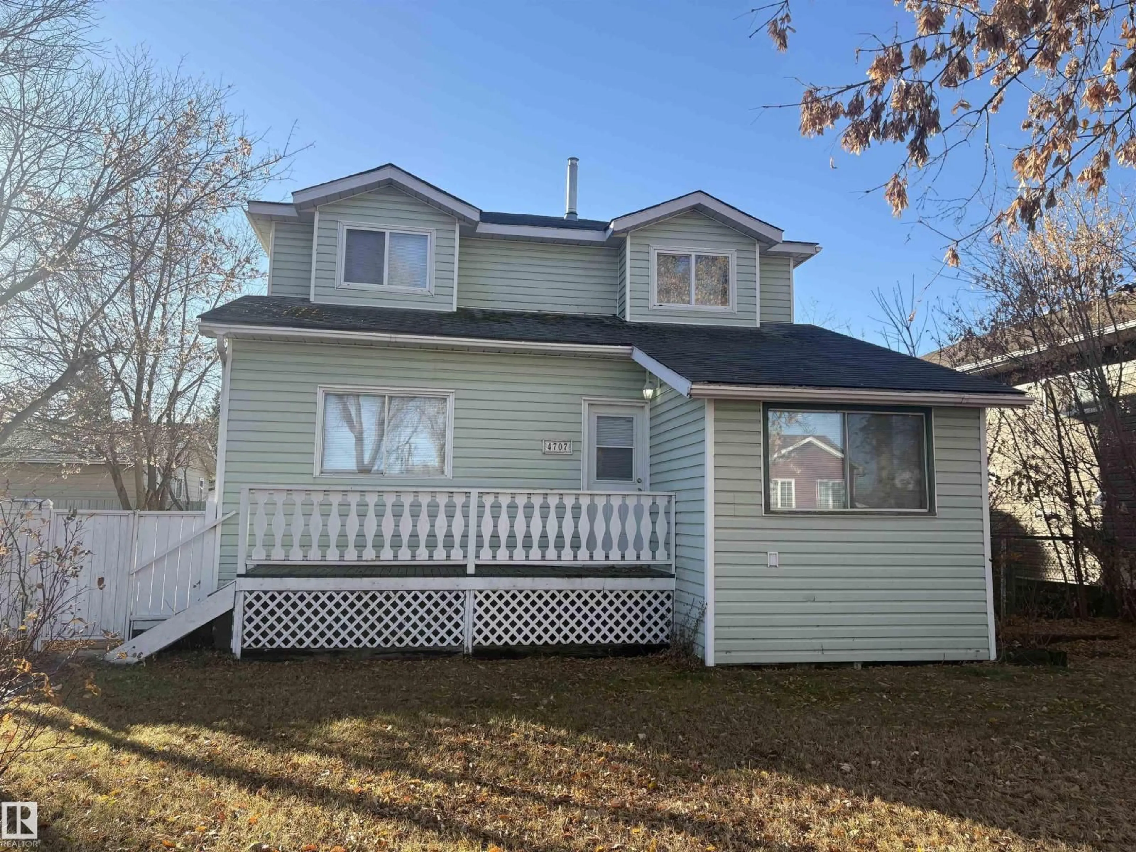 Home with vinyl exterior material, street for 4707 47 AV, Redwater Alberta T0A2W0