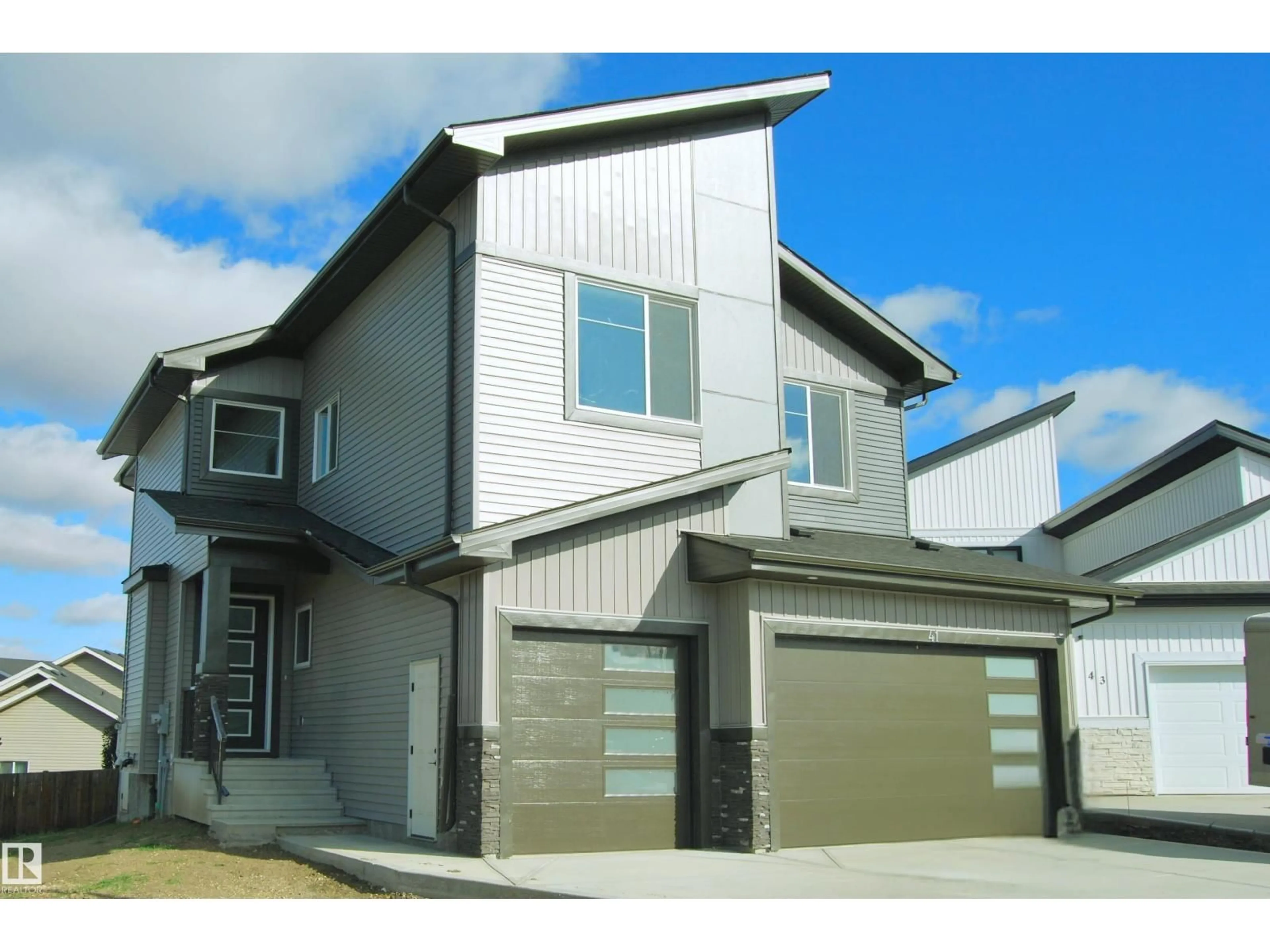 Home with vinyl exterior material, street for 41 HULL WD, Spruce Grove Alberta T7X0X5