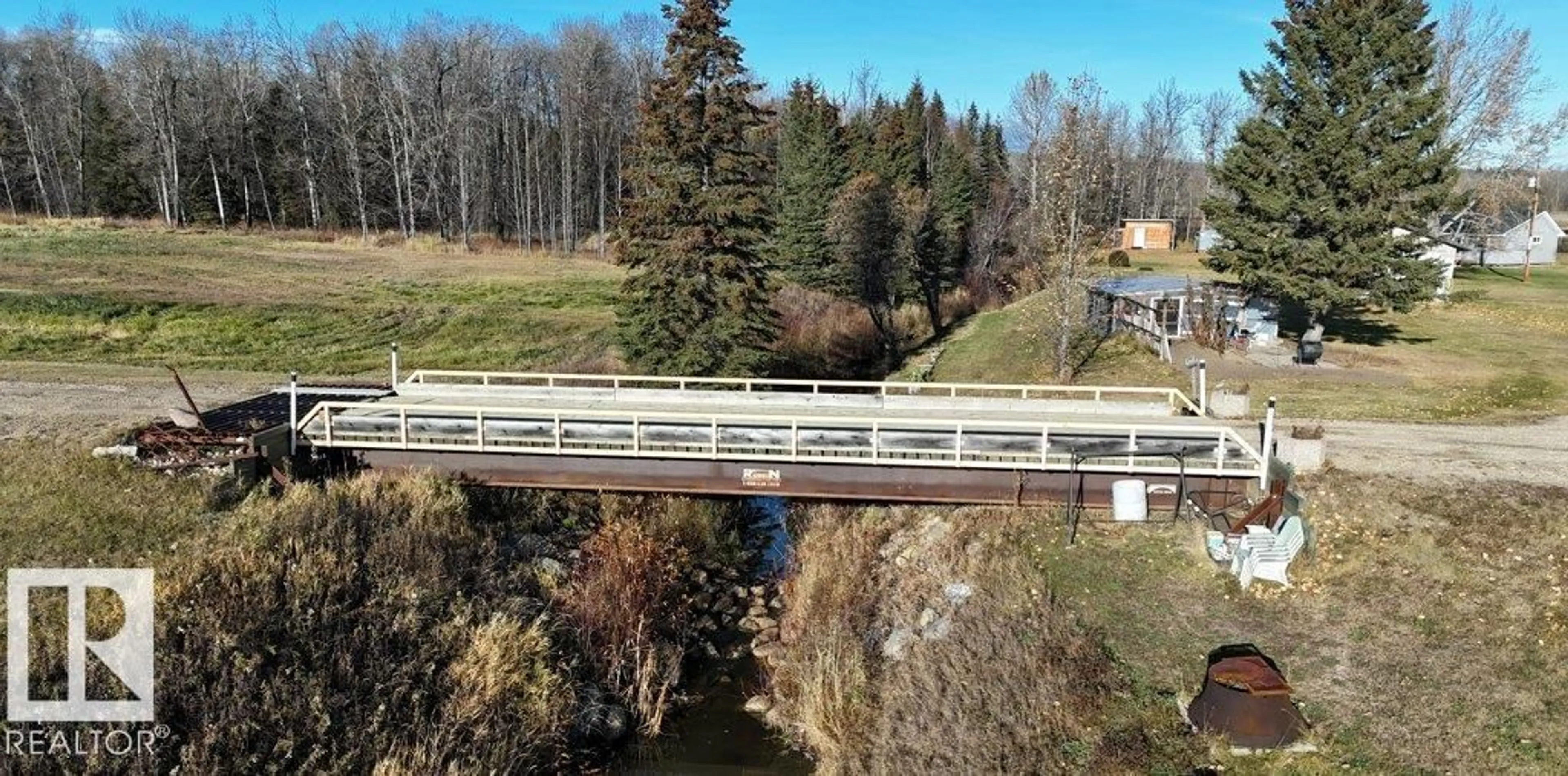 A pic from outside/outdoor area/front of a property/back of a property/a pic from drone, unknown for 101034A TWP ROAD 590, Rural Woodlands County Alberta T7S1S1