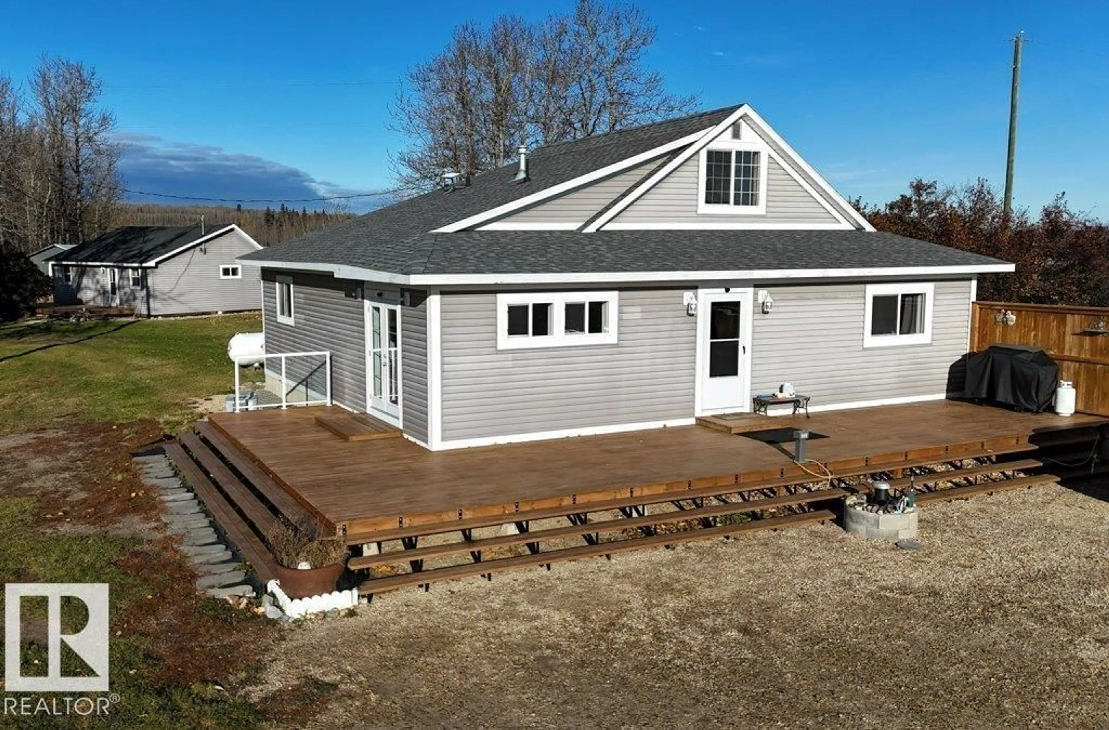 A pic from outside/outdoor area/front of a property/back of a property/a pic from drone, unknown for 101034A TWP ROAD 590, Rural Woodlands County Alberta T7S1S1
