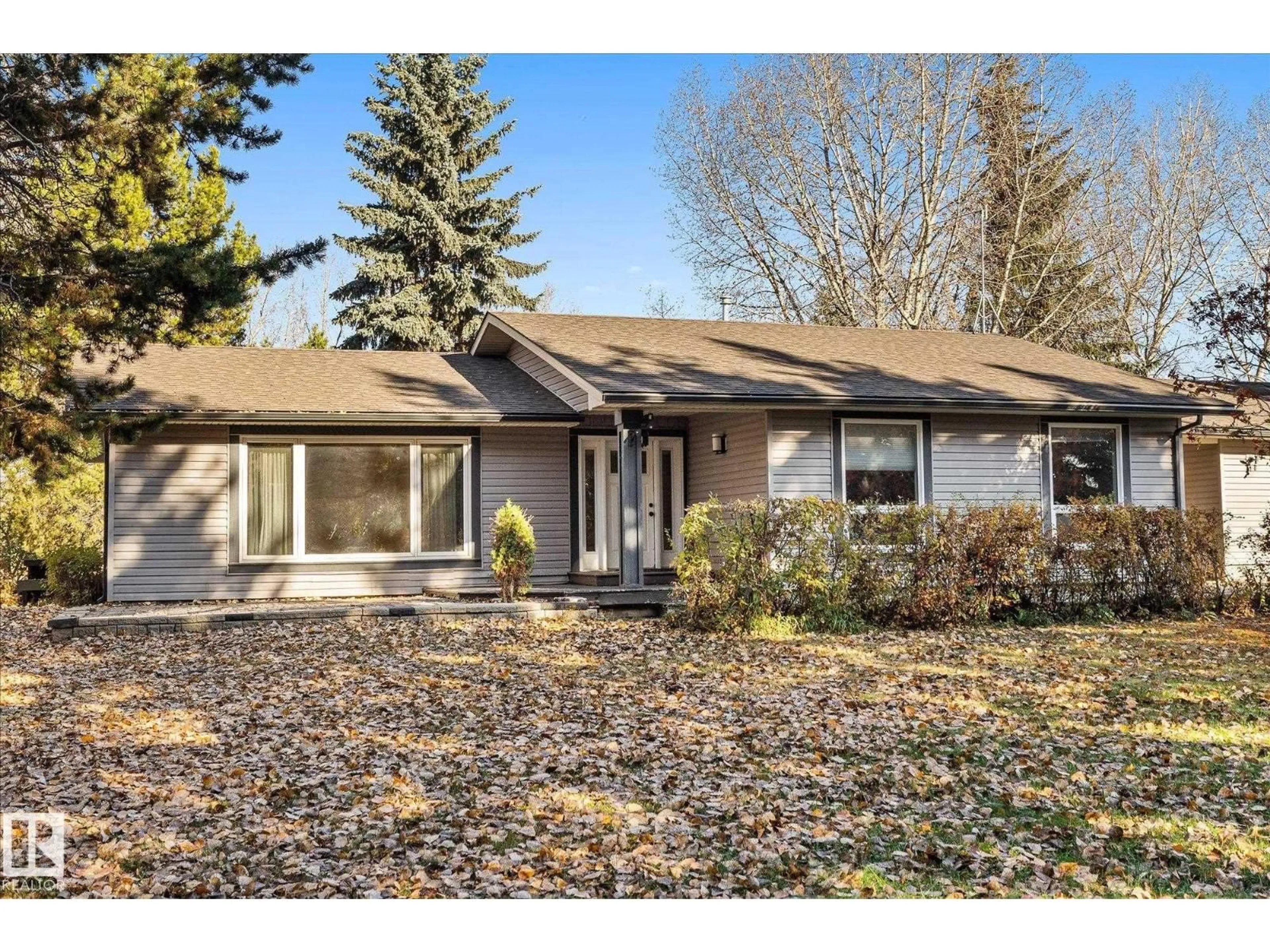 Home with vinyl exterior material, street for 27420 - 12 TWP ROAD 540, Rural Parkland County Alberta T7X3S7