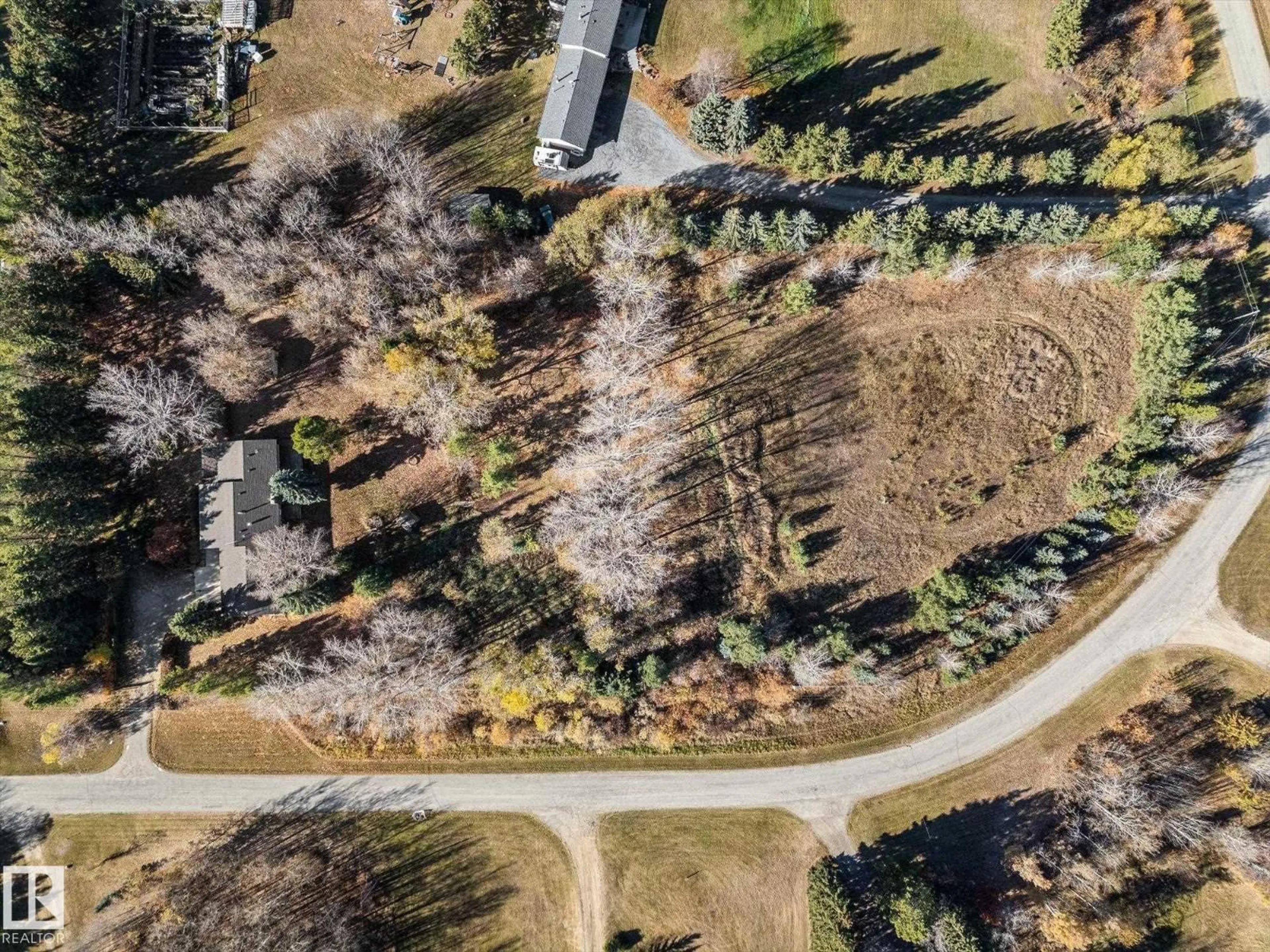 A pic from outside/outdoor area/front of a property/back of a property/a pic from drone, forest/trees view for 27420 - 12 TWP ROAD 540, Rural Parkland County Alberta T7X3S7