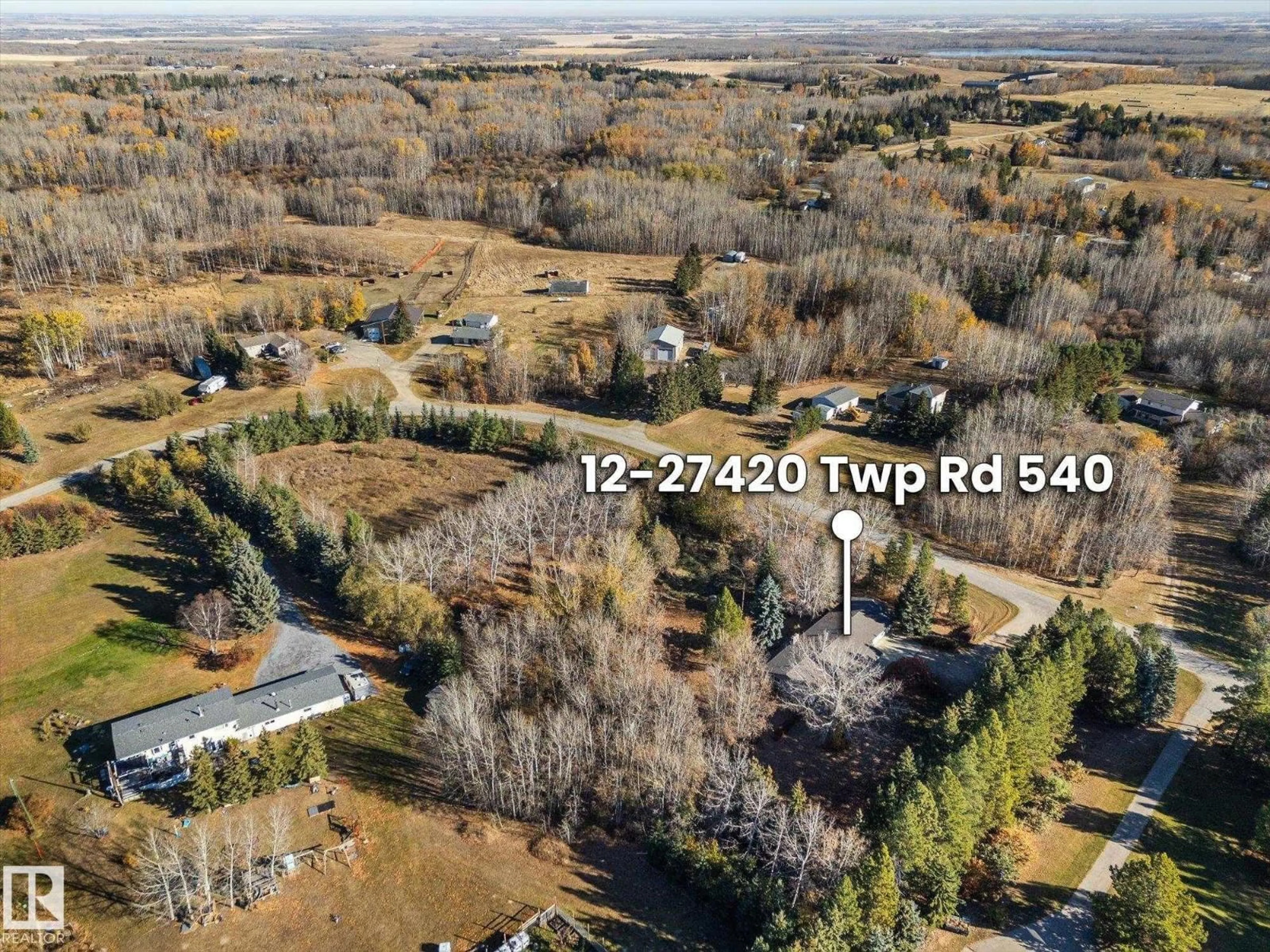 A pic from outside/outdoor area/front of a property/back of a property/a pic from drone, forest/trees view for 27420 - 12 TWP ROAD 540, Rural Parkland County Alberta T7X3S7
