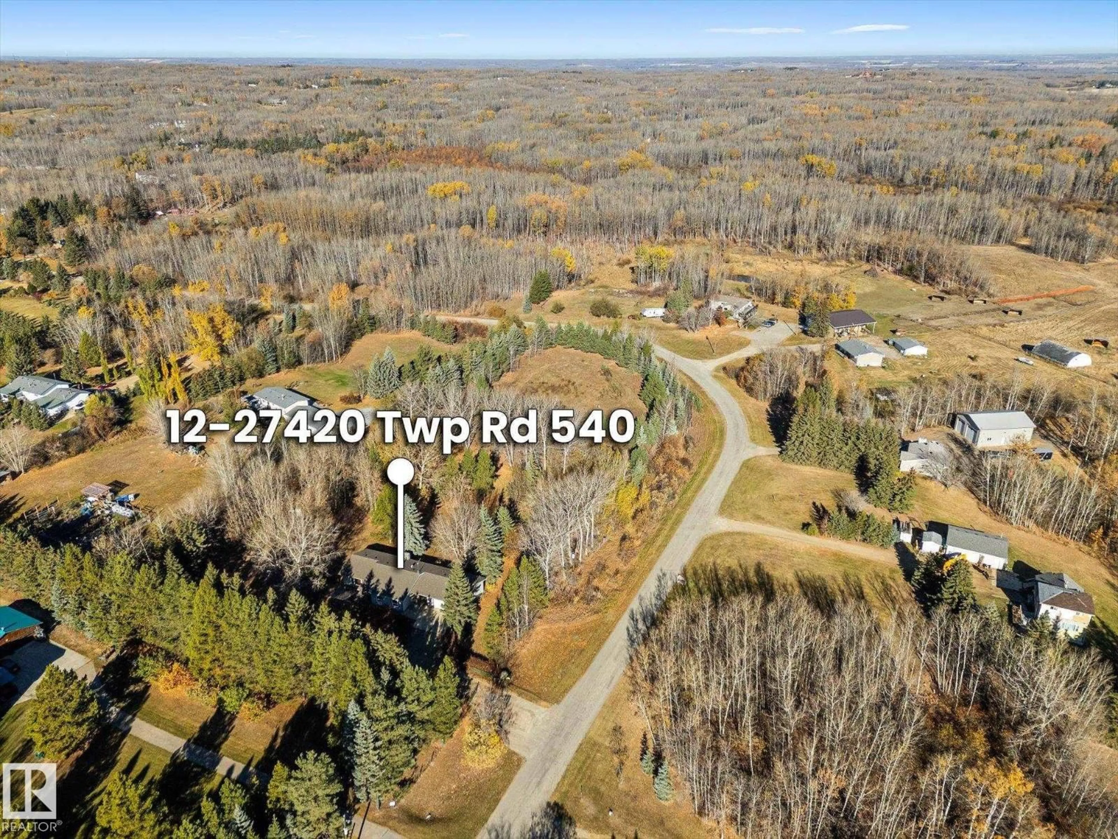 A pic from outside/outdoor area/front of a property/back of a property/a pic from drone, forest/trees view for 27420 - 12 TWP ROAD 540, Rural Parkland County Alberta T7X3S7