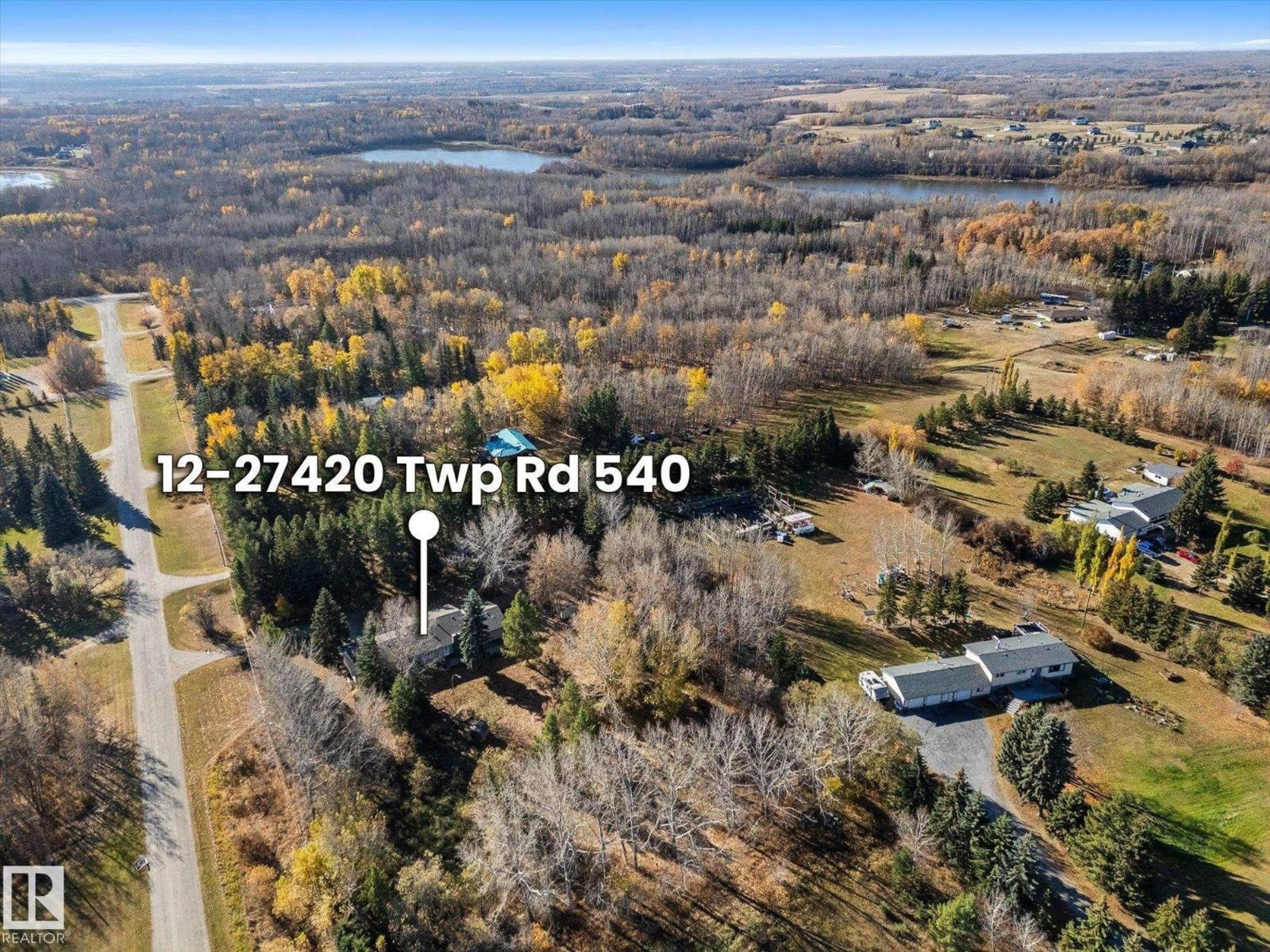 A pic from outside/outdoor area/front of a property/back of a property/a pic from drone, water/lake/river/ocean view for 27420 - 12 TWP ROAD 540, Rural Parkland County Alberta T7X3S7