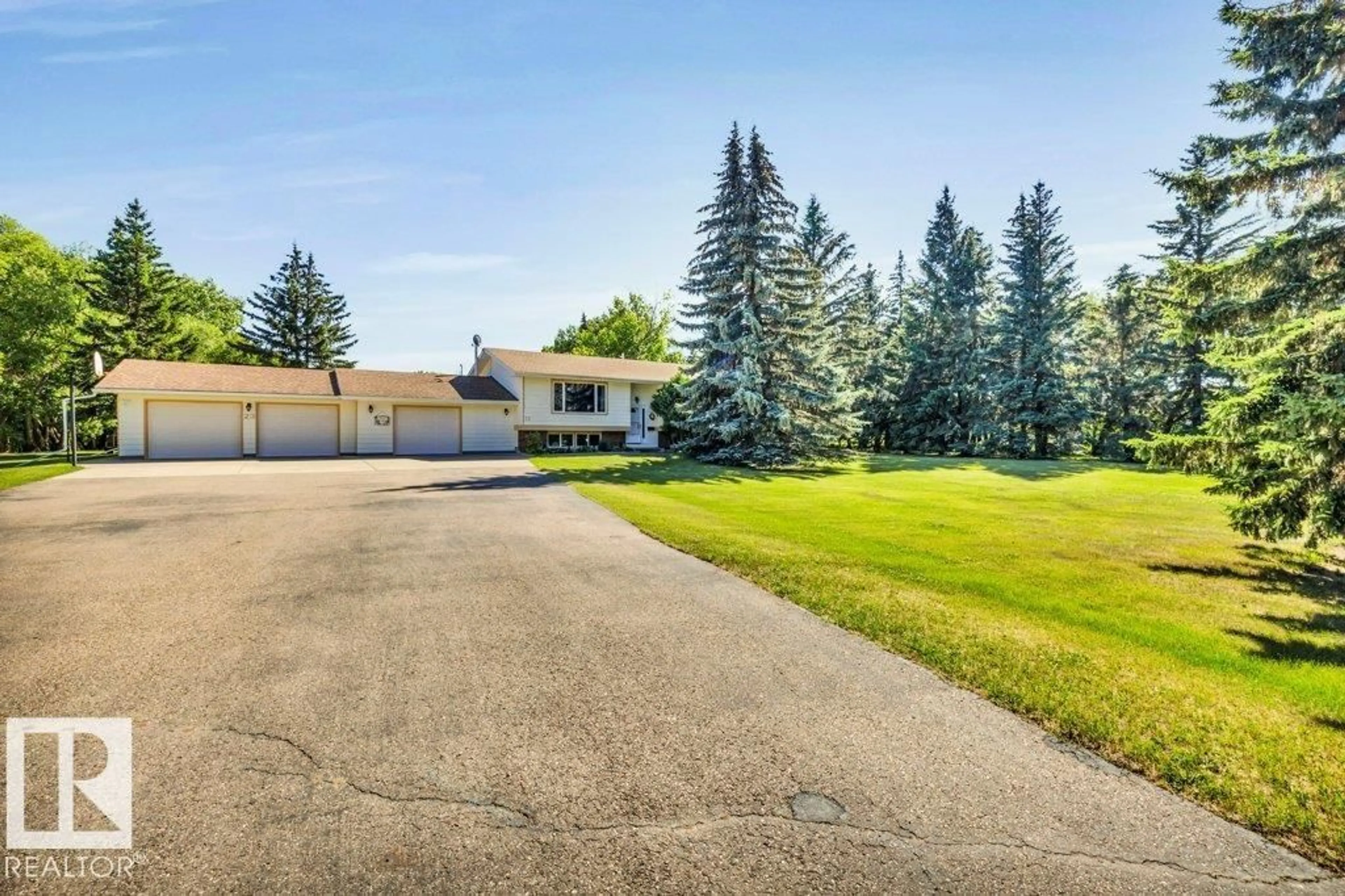 A pic from outside/outdoor area/front of a property/back of a property/a pic from drone, unknown for 23 - 51514 RGE RD 261, Rural Parkland County Alberta T7Y1B3