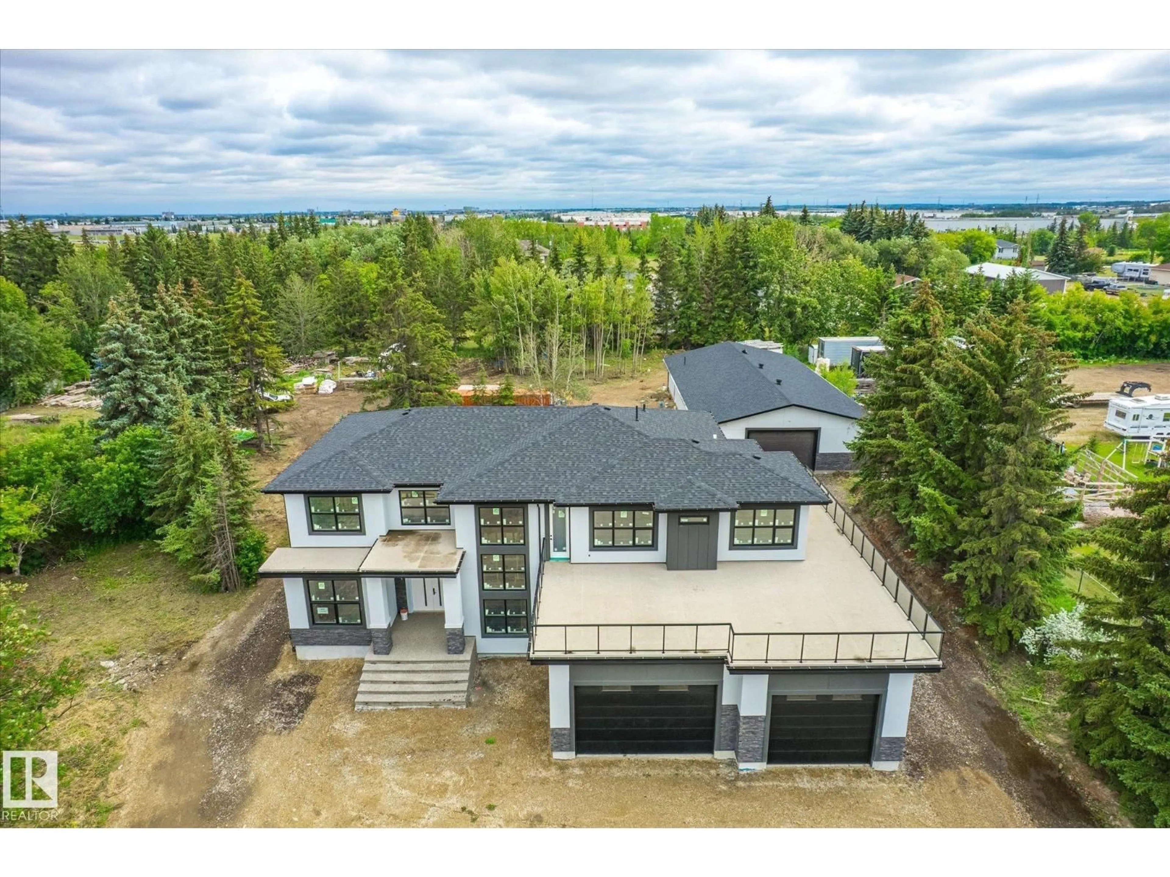 A pic from outside/outdoor area/front of a property/back of a property/a pic from drone, unknown for 18445 122 AV, Edmonton Alberta T5V1R4