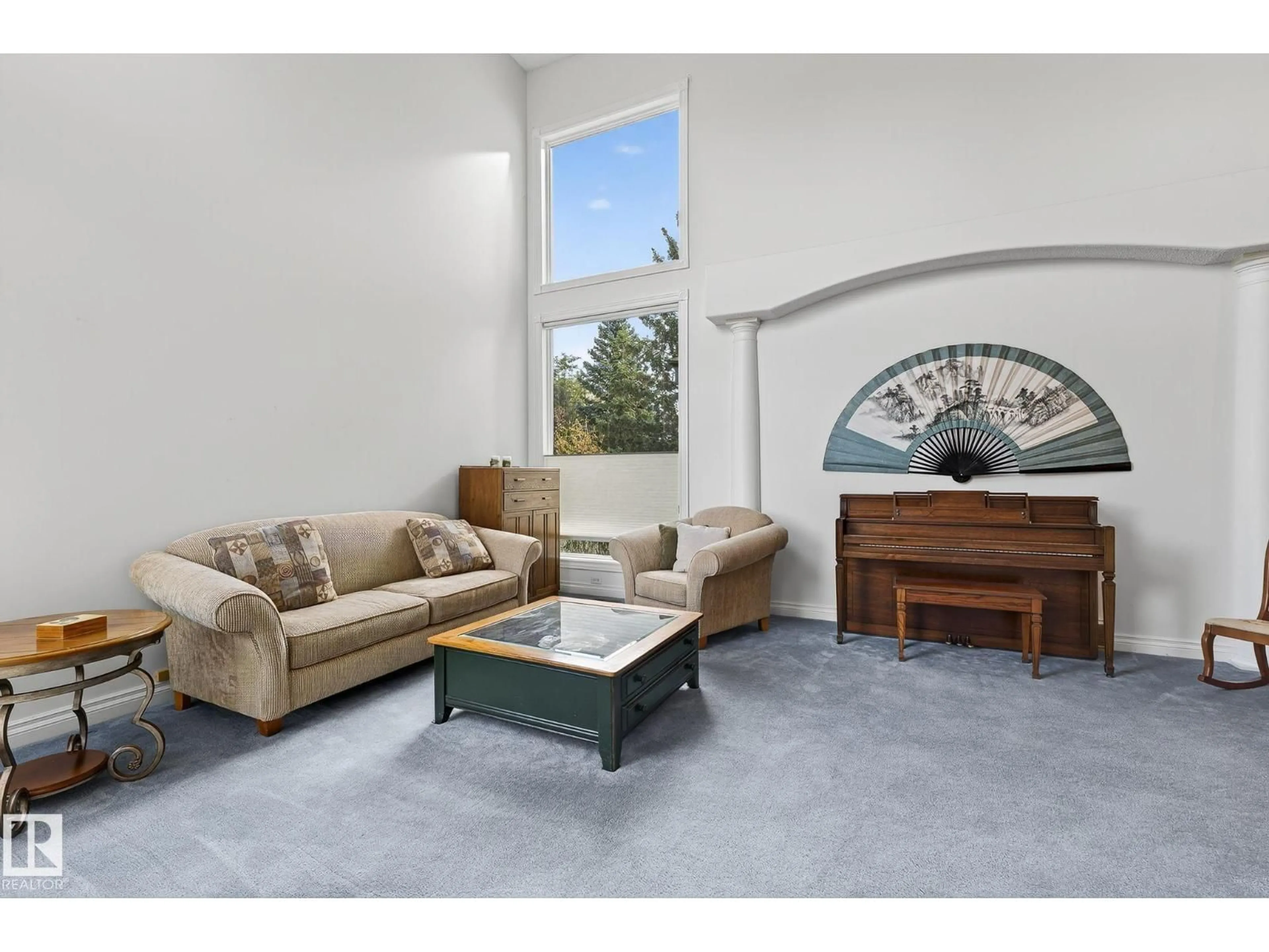 Living room with furniture, ceramic/tile floor for 1377 CARTER CREST RD, Edmonton Alberta T6R2L5