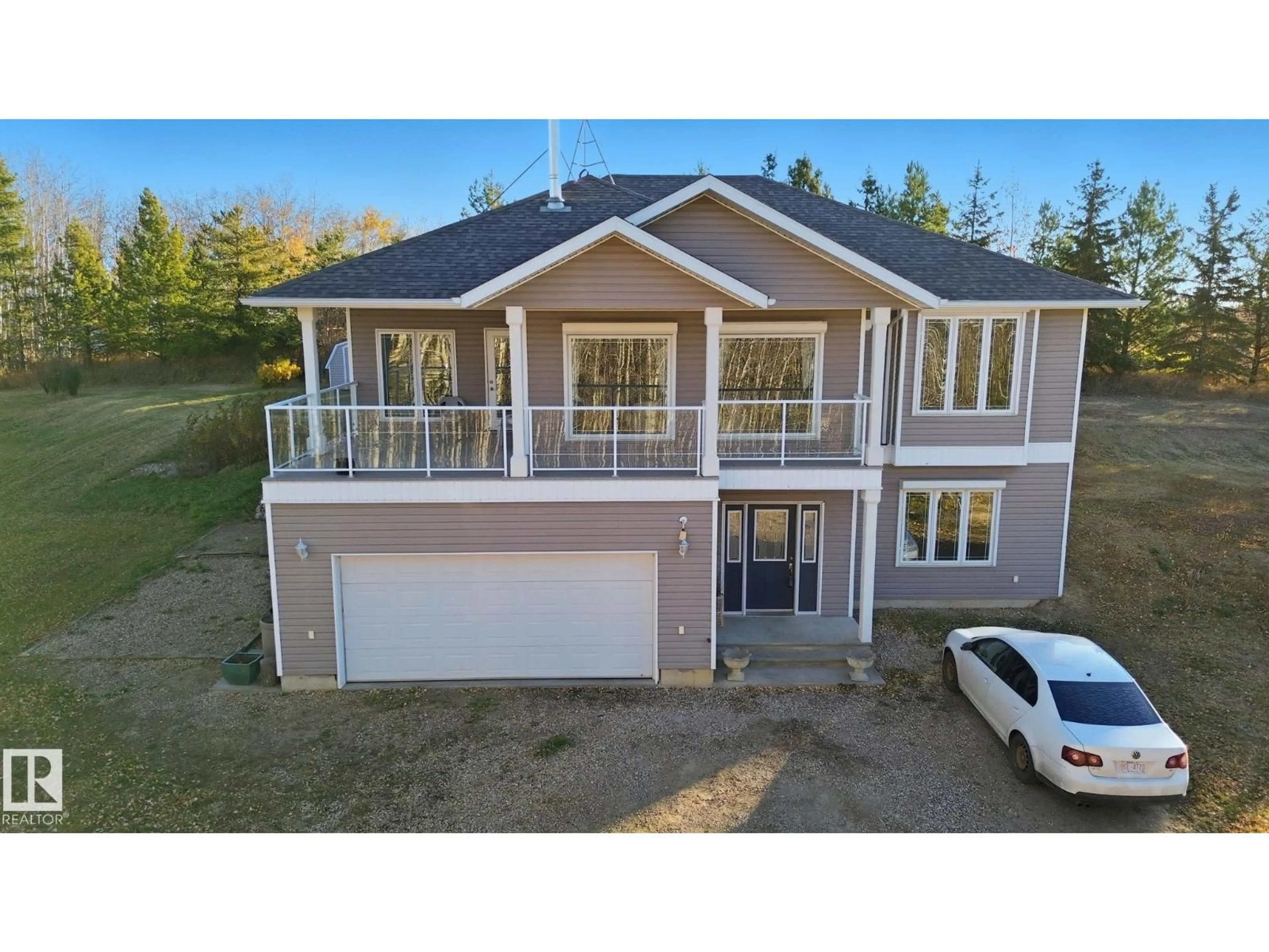 A pic from outside/outdoor area/front of a property/back of a property/a pic from drone, building for 28 - 1316 TWP ROAD 533, Rural Parkland County Alberta T7Y0G2