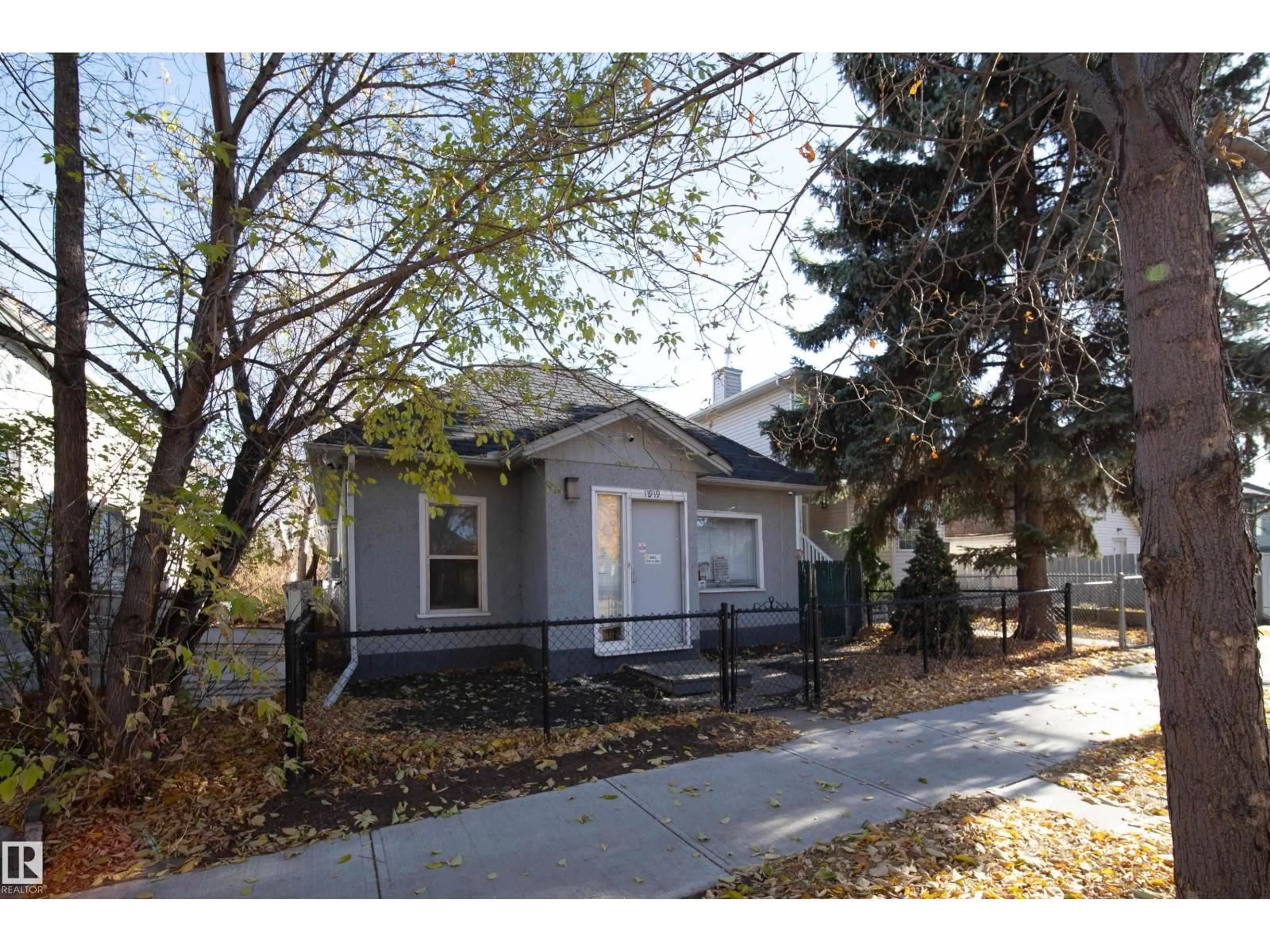 Home with vinyl exterior material, street for NW - 11919 77 ST, Edmonton Alberta T5B2G5