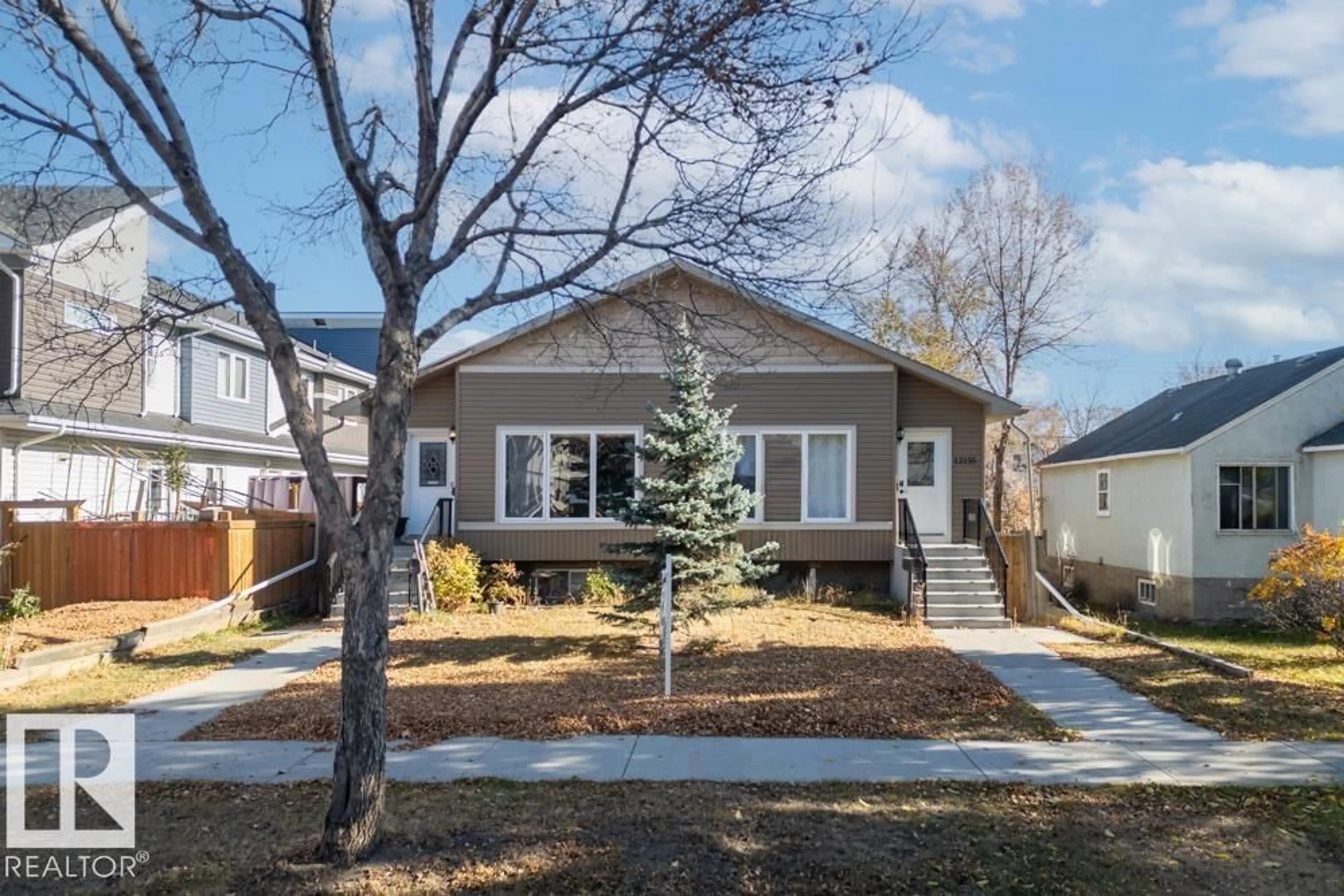 Home with vinyl exterior material, street for NW - 12135 & 12137 124 ST, Edmonton Alberta T5N0N1