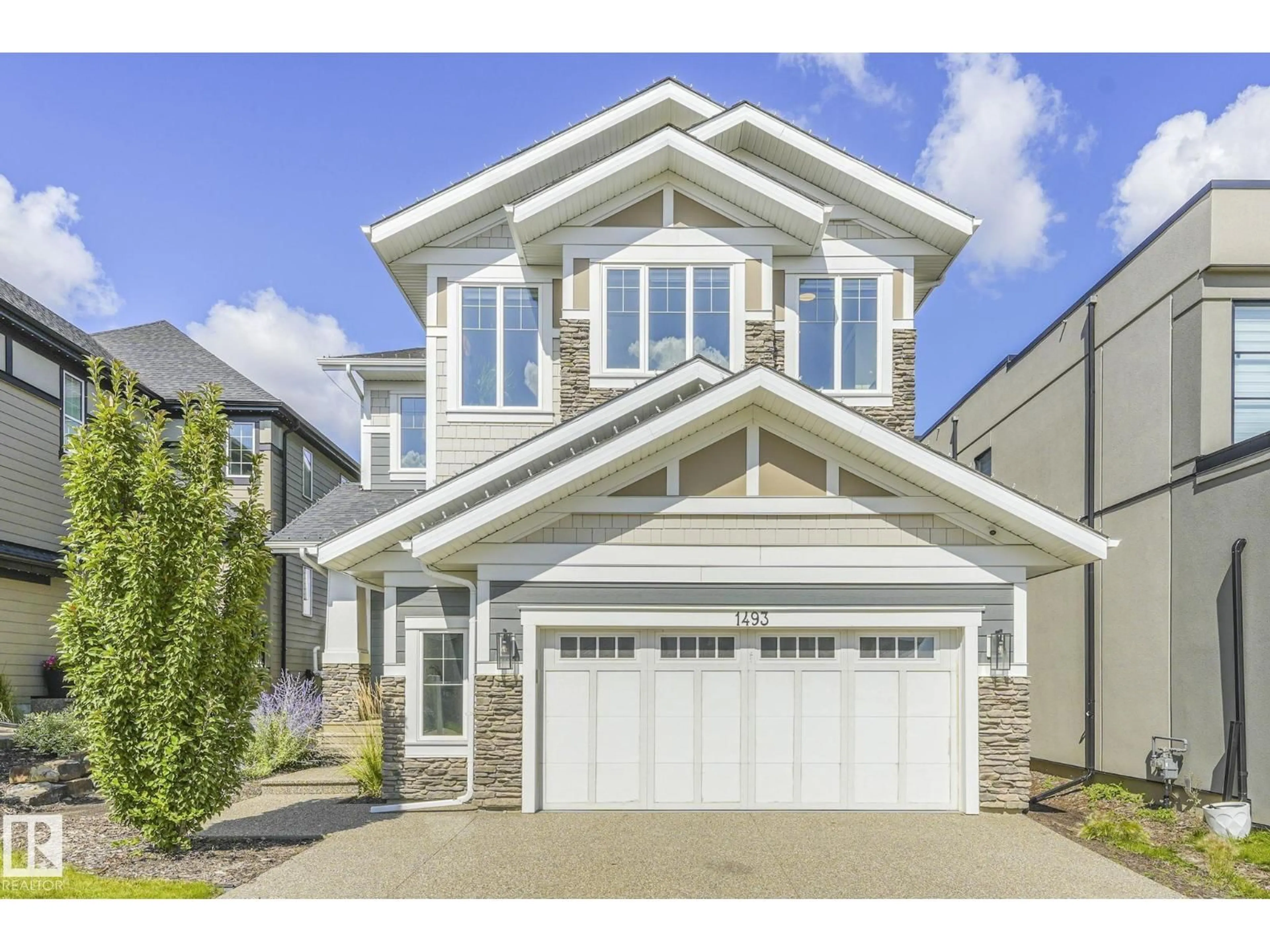 Home with vinyl exterior material, street for 1493 HOWES CRESCENT, Edmonton Alberta T4X0X5