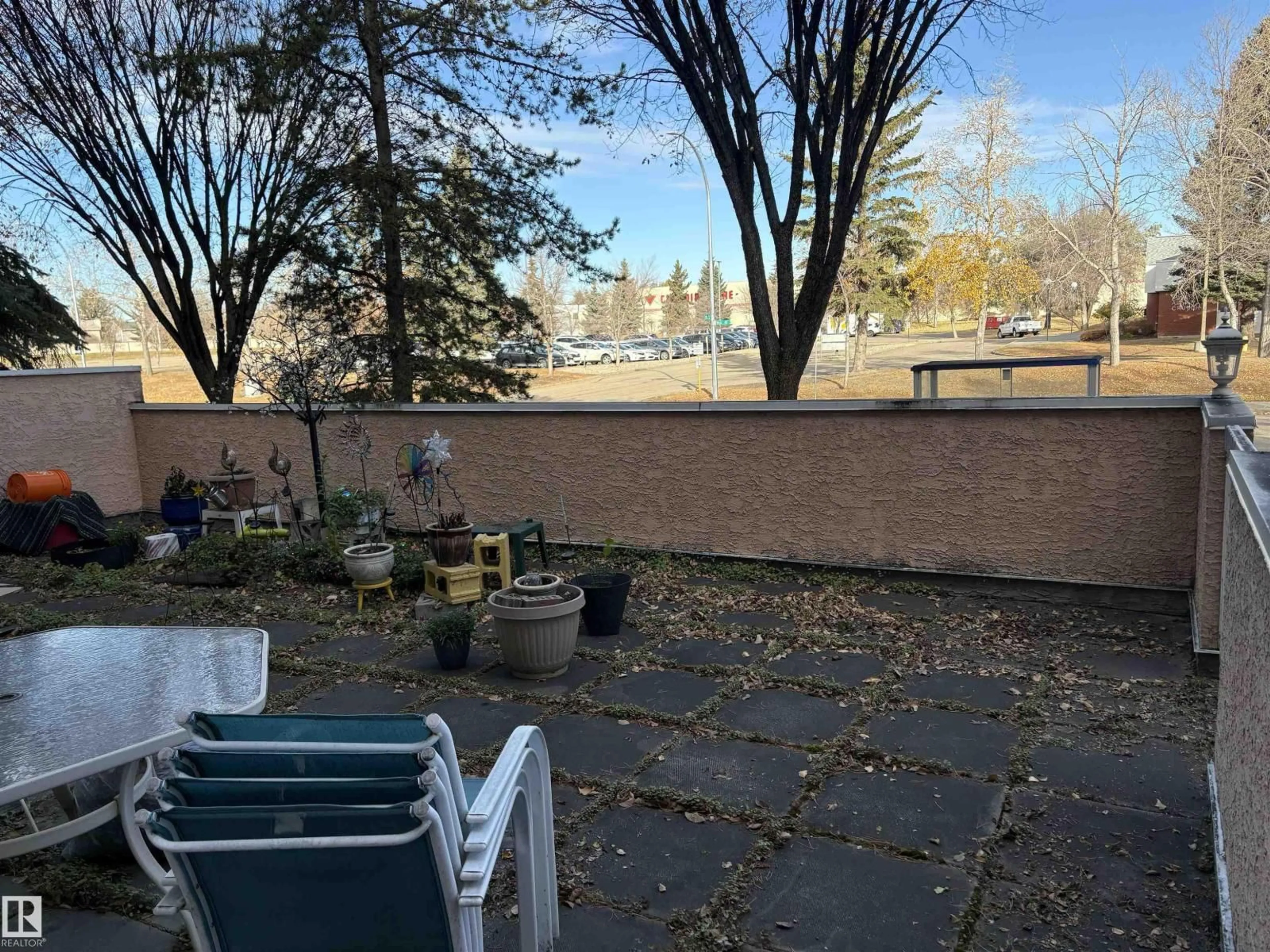 Patio, city buildings view from balcony for #102 - 17519 98A AV, Edmonton Alberta T5T6C1