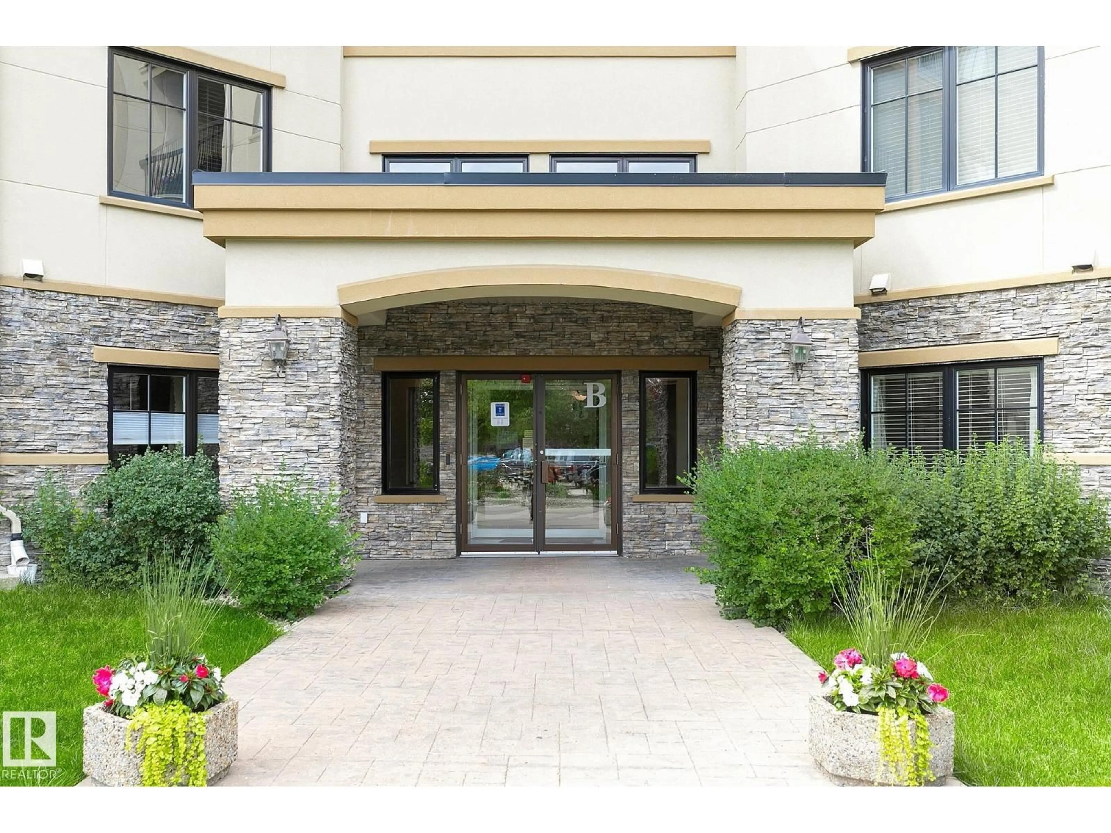 Indoor foyer for 160 MAGRATH RD, Edmonton Alberta T6R3T7