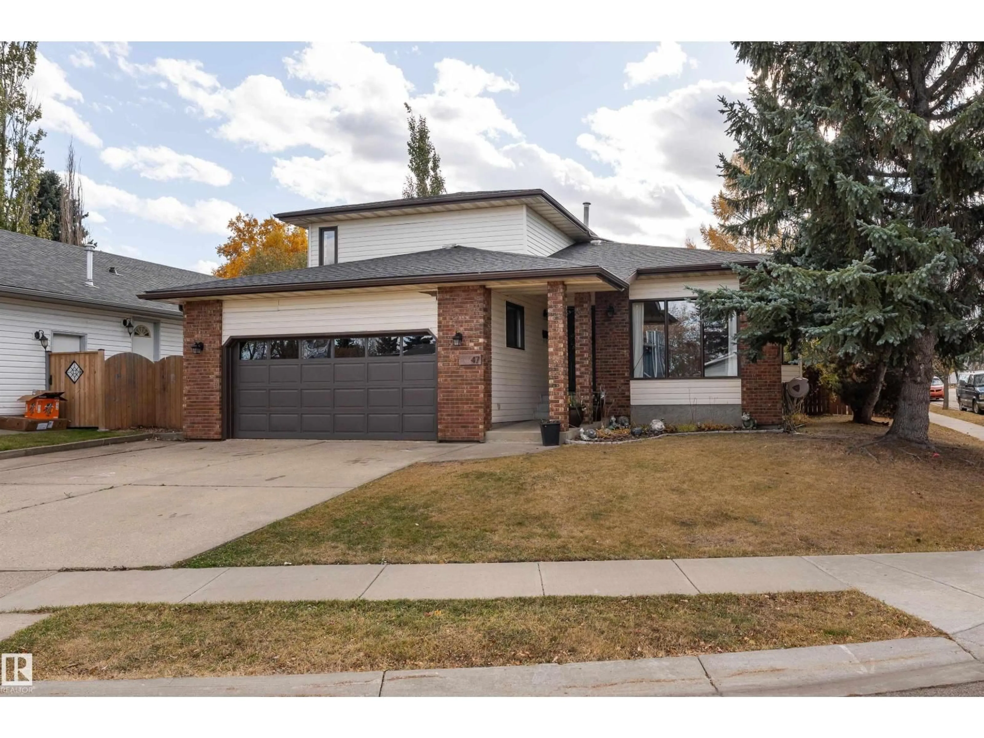 Home with brick exterior material, street for 47 COACHMAN WY, Sherwood Park Alberta T8H1C2