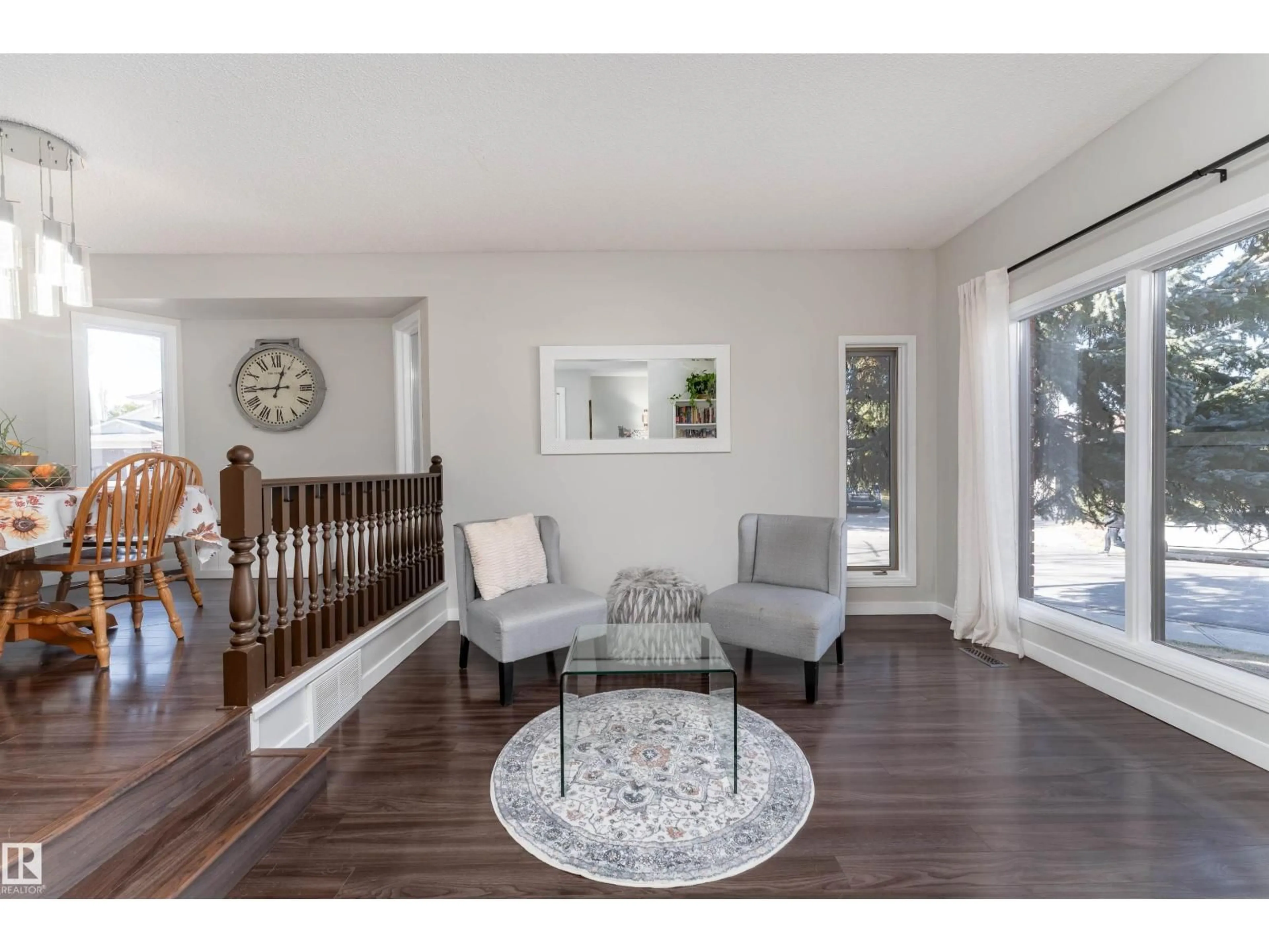 Living room with furniture, wood/laminate floor for 47 COACHMAN WY, Sherwood Park Alberta T8H1C2