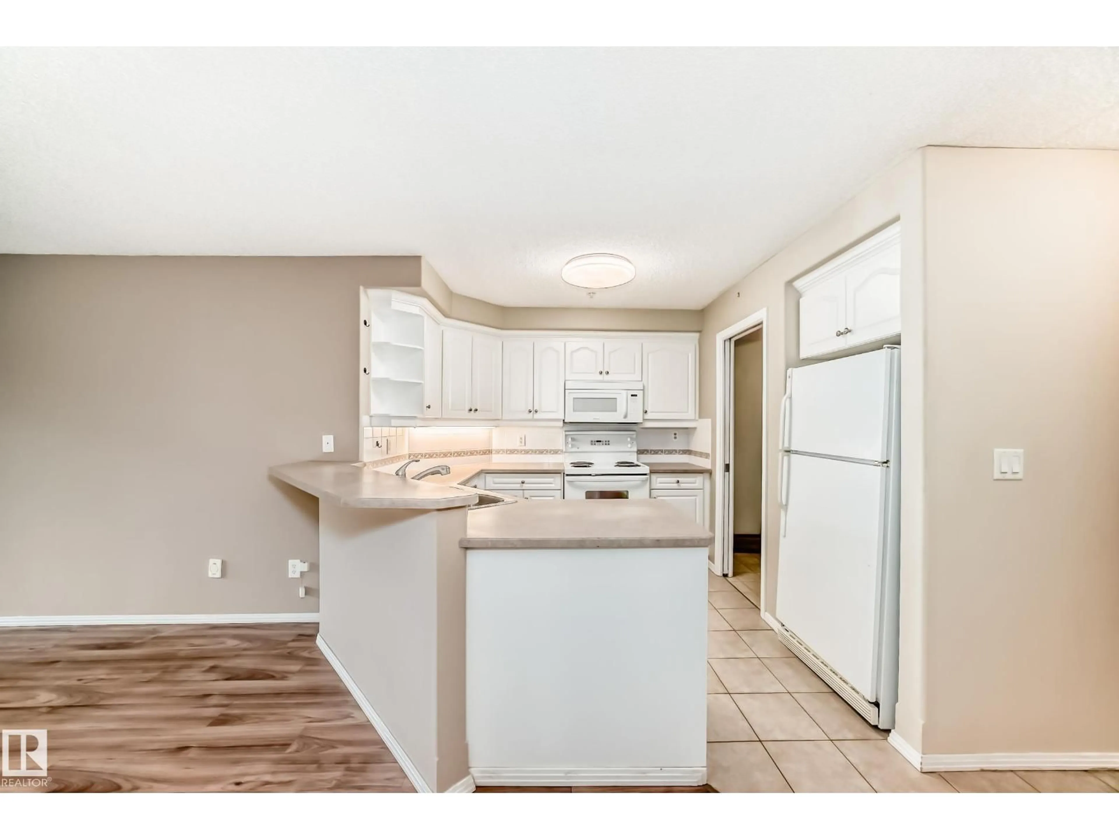 Open concept kitchen, unknown for #141 - 9704 174 ST, Edmonton Alberta T5T6J4