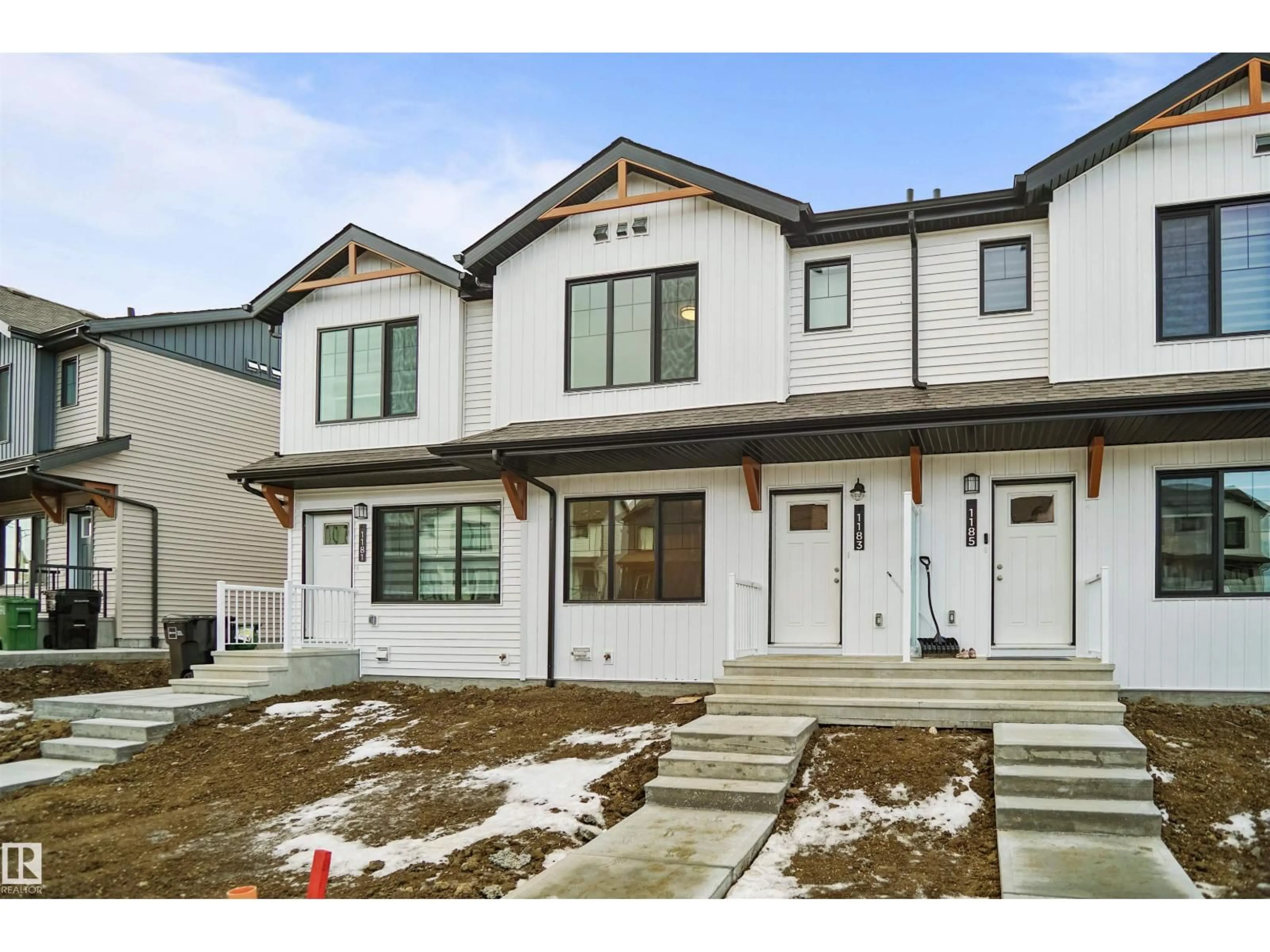 Home with vinyl exterior material, street for 431 ASTER DR, Edmonton Alberta T6T2N8