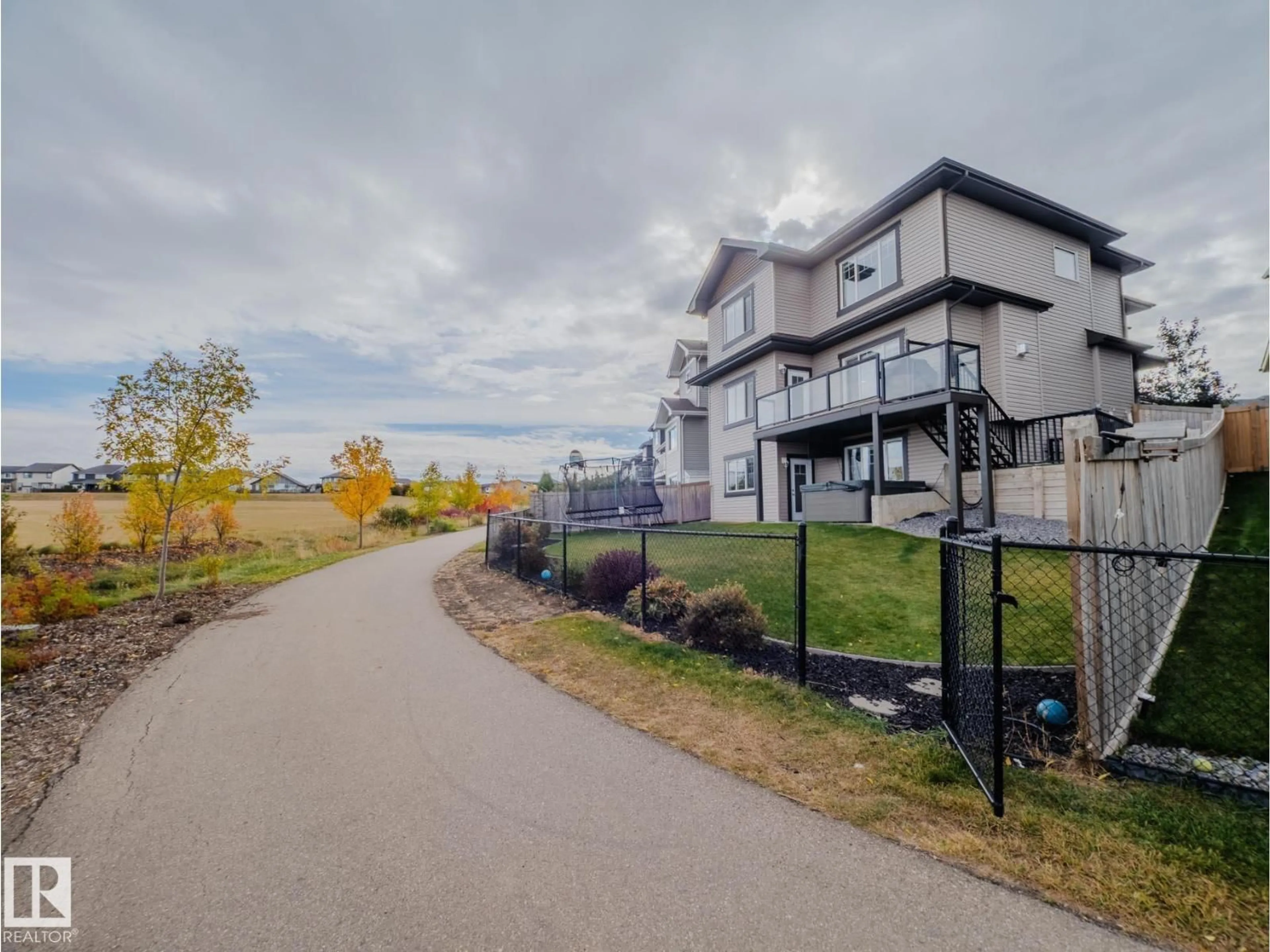 A pic from outside/outdoor area/front of a property/back of a property/a pic from drone, unknown for LI NW - 1049 COOPERS HAWK LINK, Edmonton Alberta T5S0M2