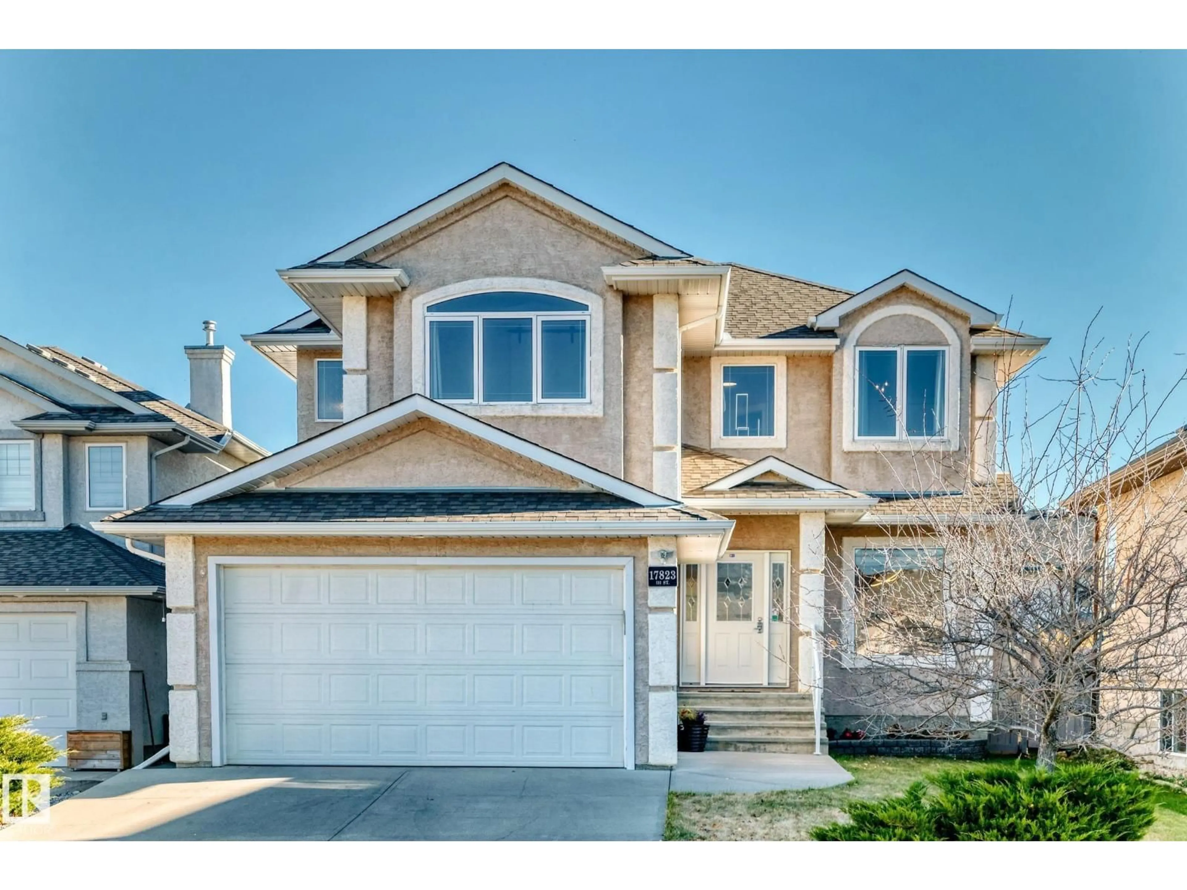 Home with vinyl exterior material, street for 17823 111 ST, Edmonton Alberta T5X6J3