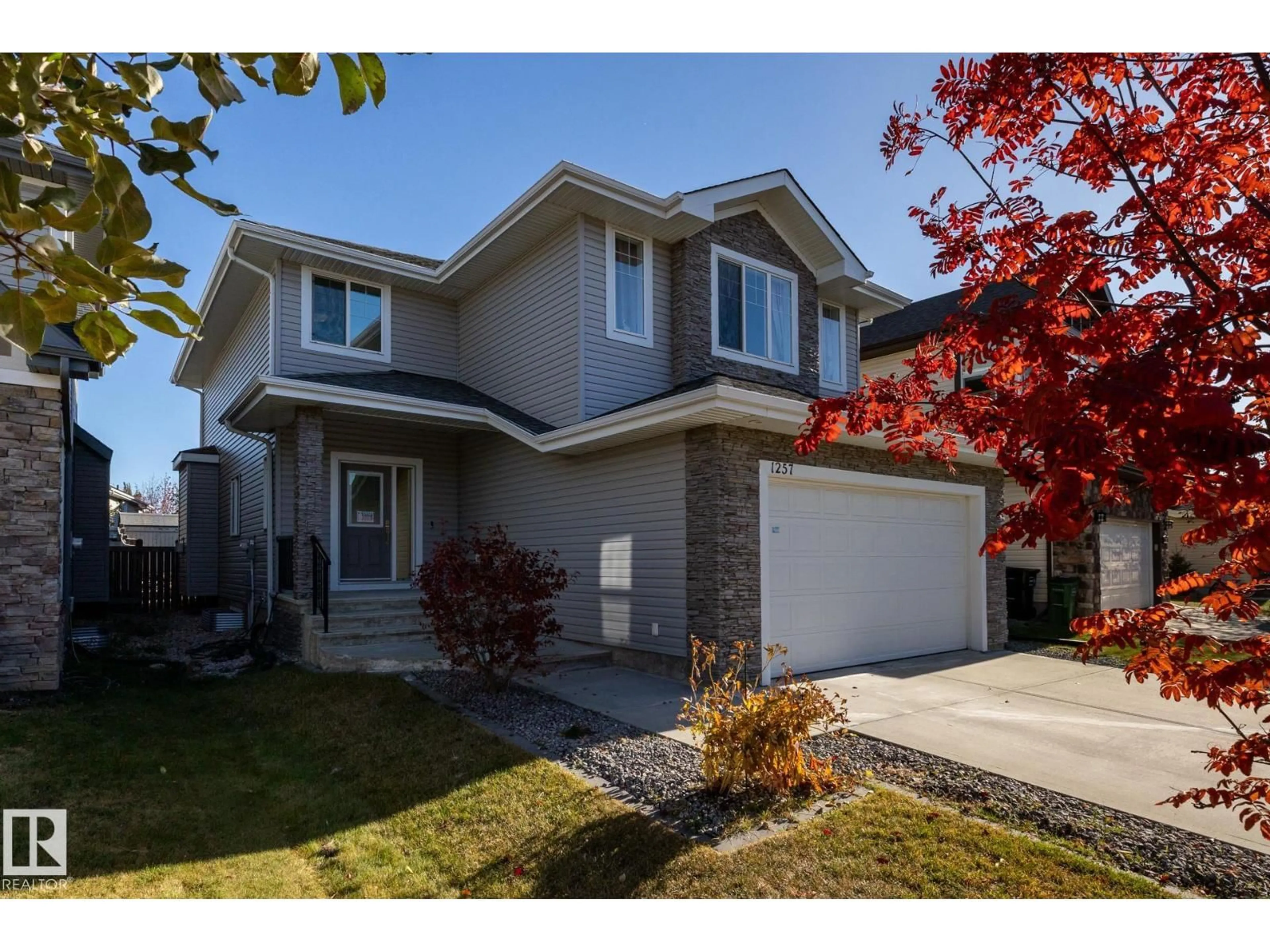 Home with vinyl exterior material, street for 1257 CUNNINGHAM DR, Edmonton Alberta T6W0R6