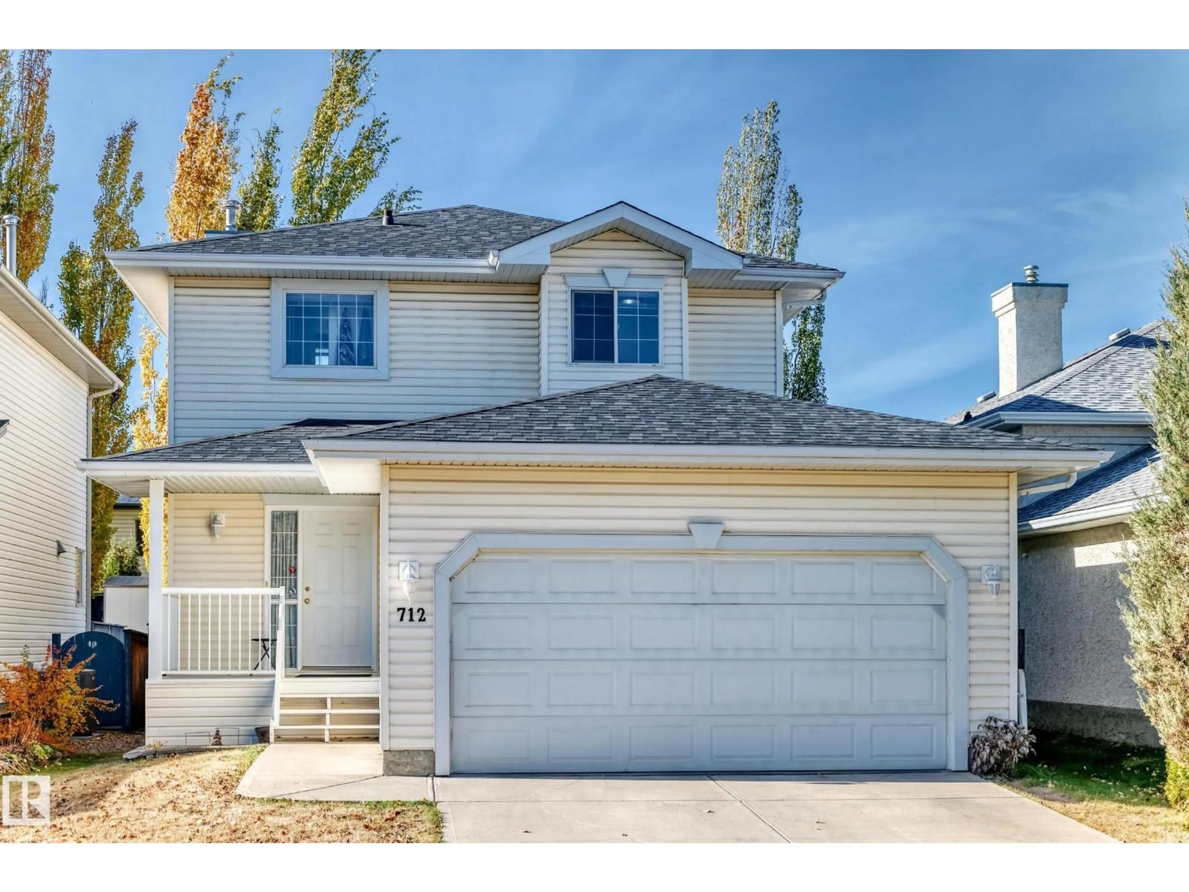 Home with vinyl exterior material, street for 712 BALFOUR CL, Edmonton Alberta T5T6H7