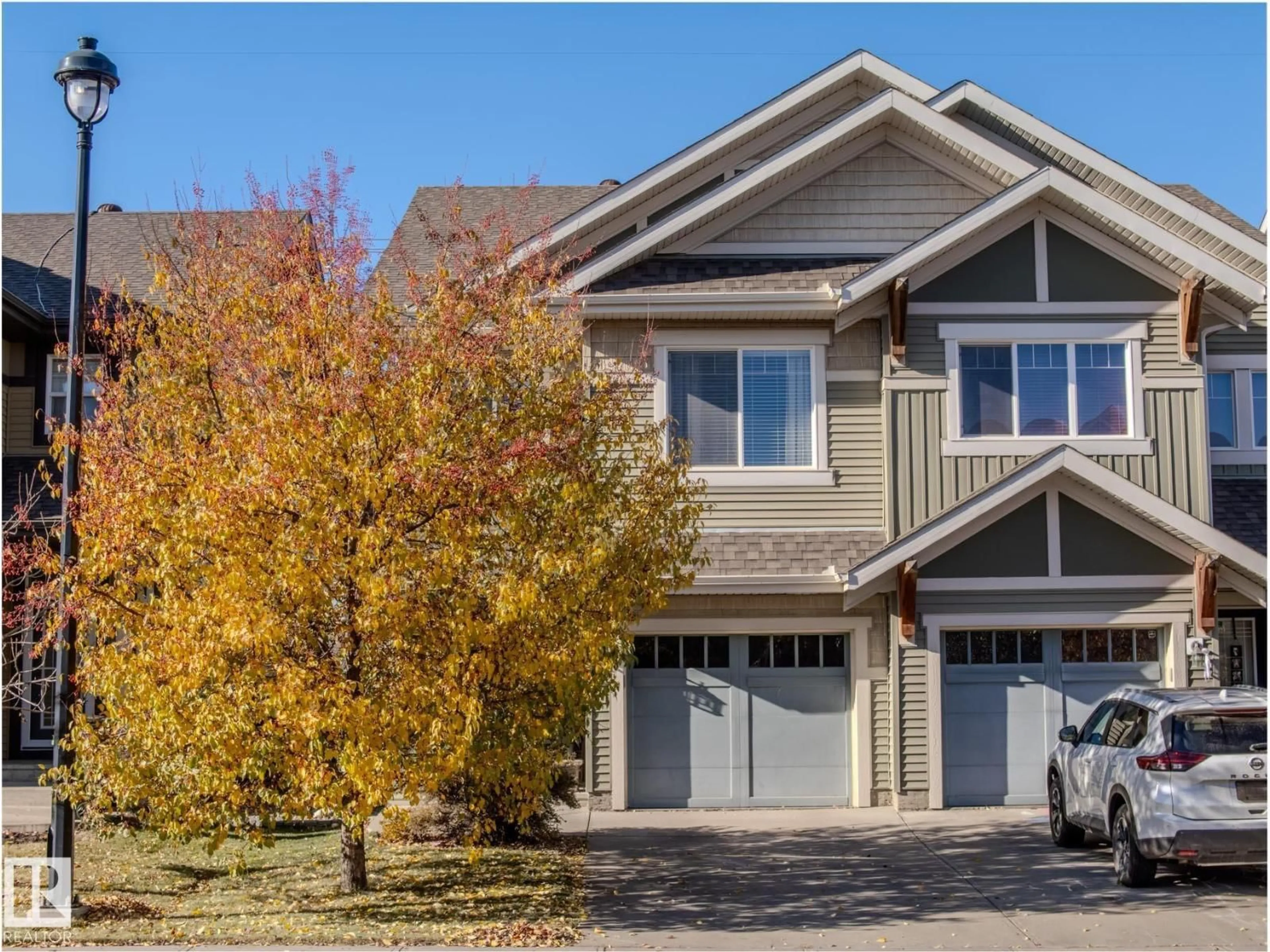 Home with vinyl exterior material, street for 1692 CHAPMAN WY, Edmonton Alberta T6W0Y6
