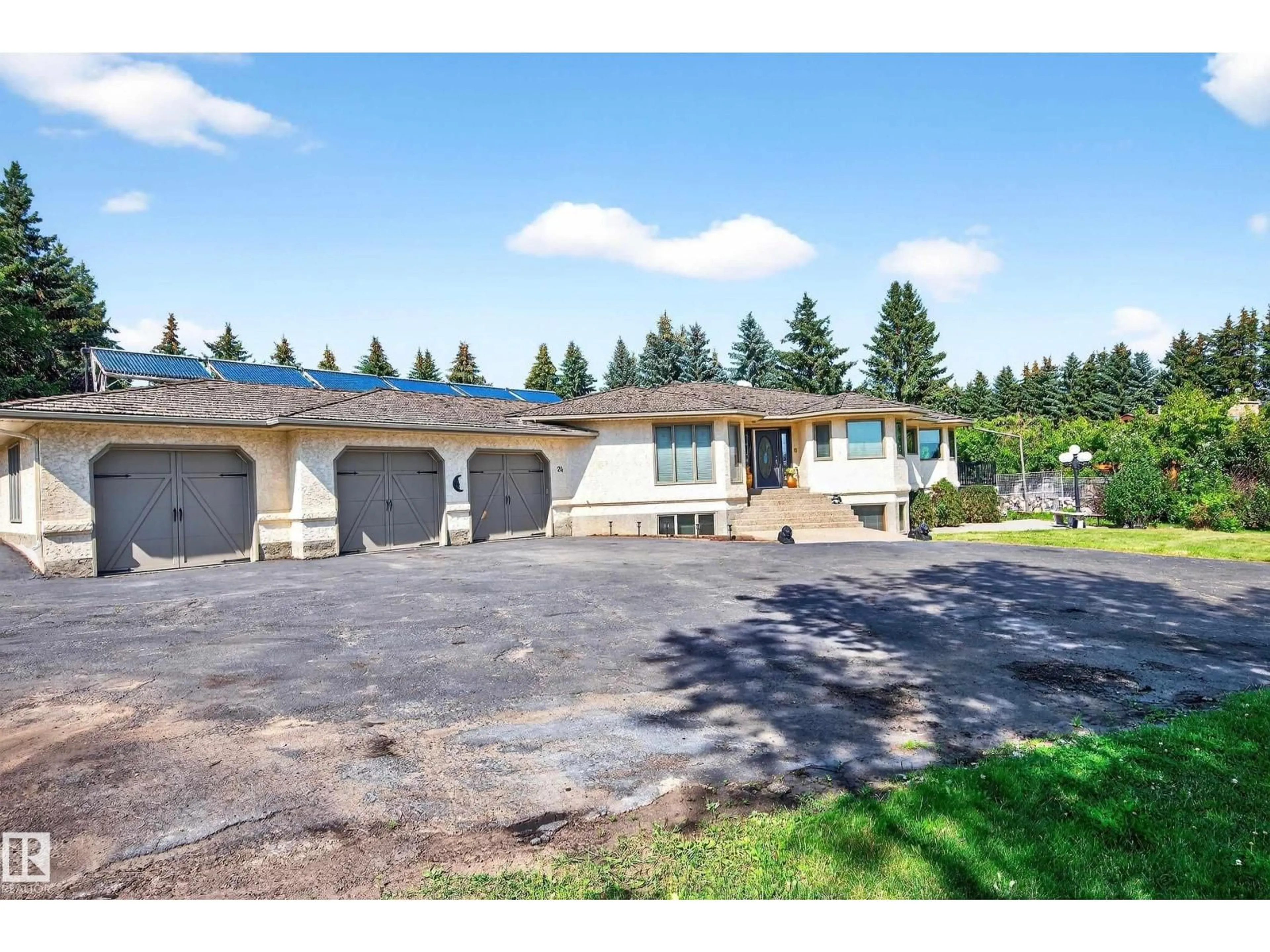 A pic from outside/outdoor area/front of a property/back of a property/a pic from drone, unknown for 24 VALLEYVIEW CR, Rural Sturgeon County Alberta T8T0C5
