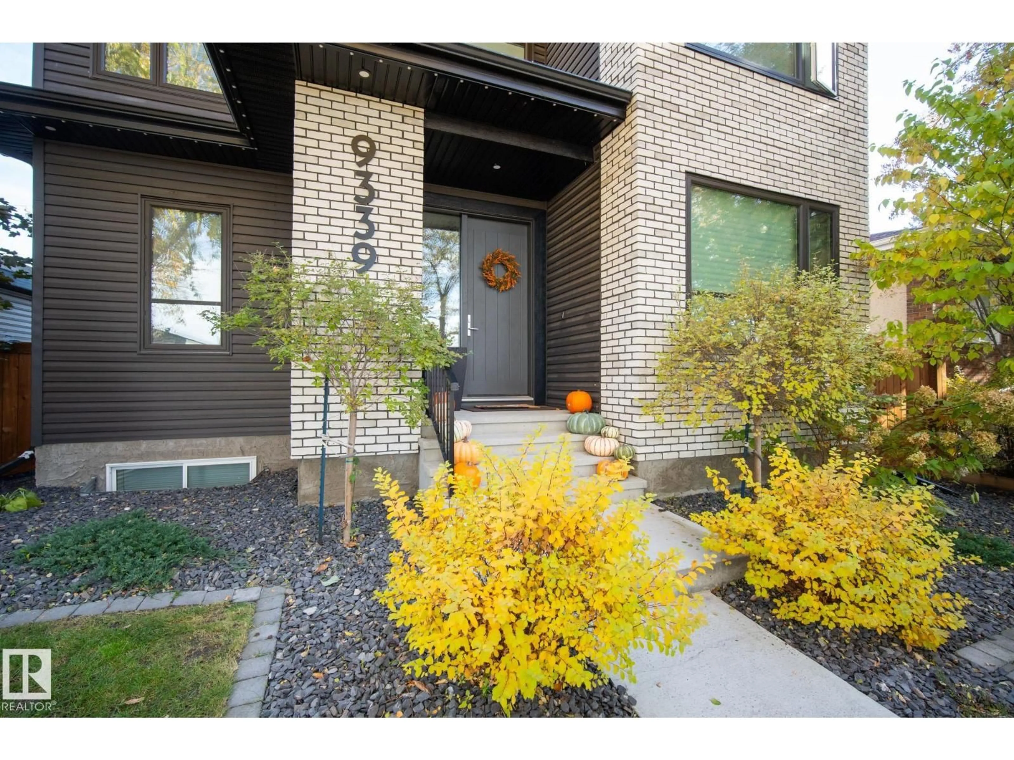 Home with brick exterior material, street for NW - 9339 91 ST, Edmonton Alberta T6C3P2