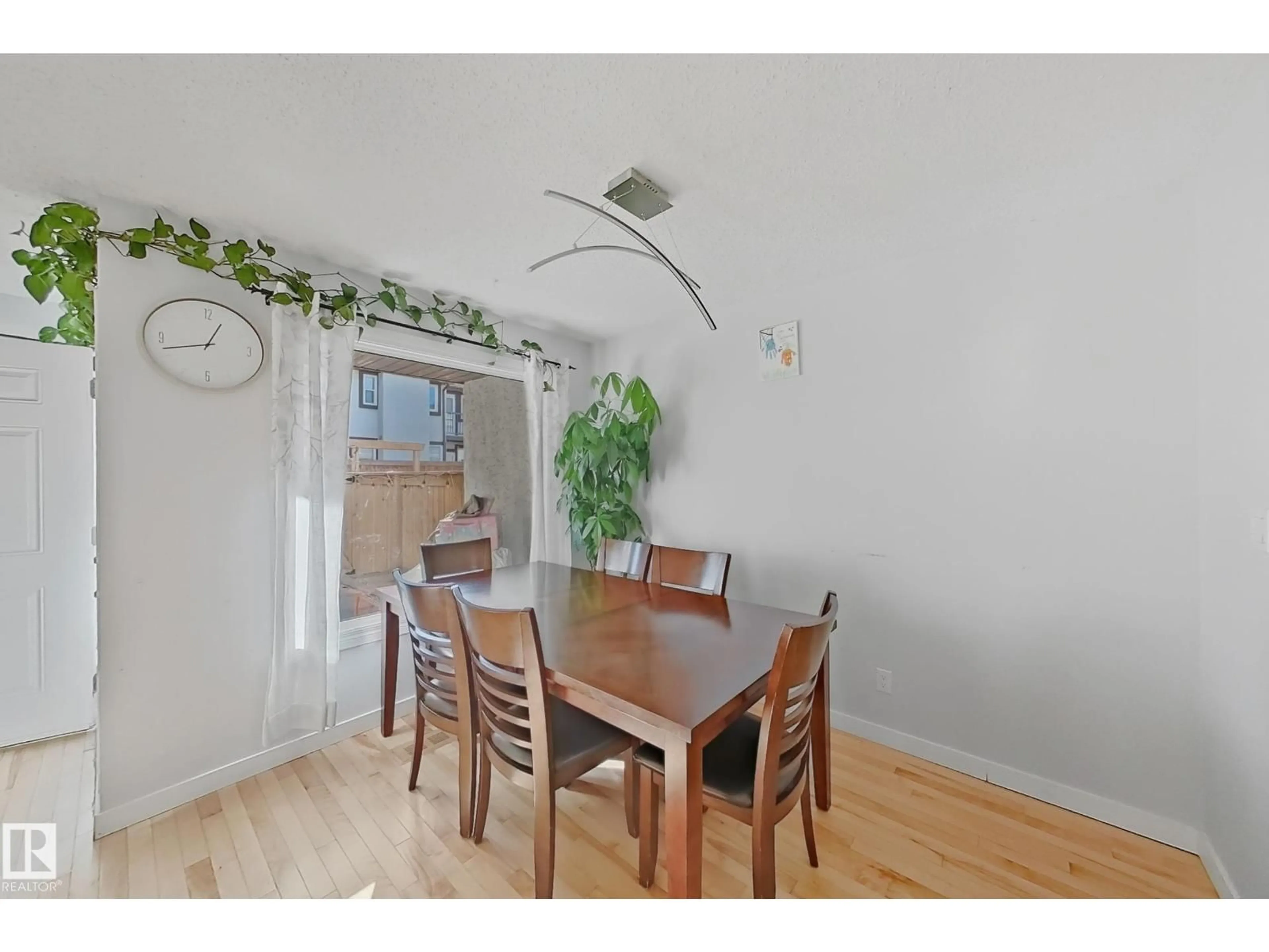 Dining room, wood/laminate floor for 3605 30 AV, Edmonton Alberta T6L5H5