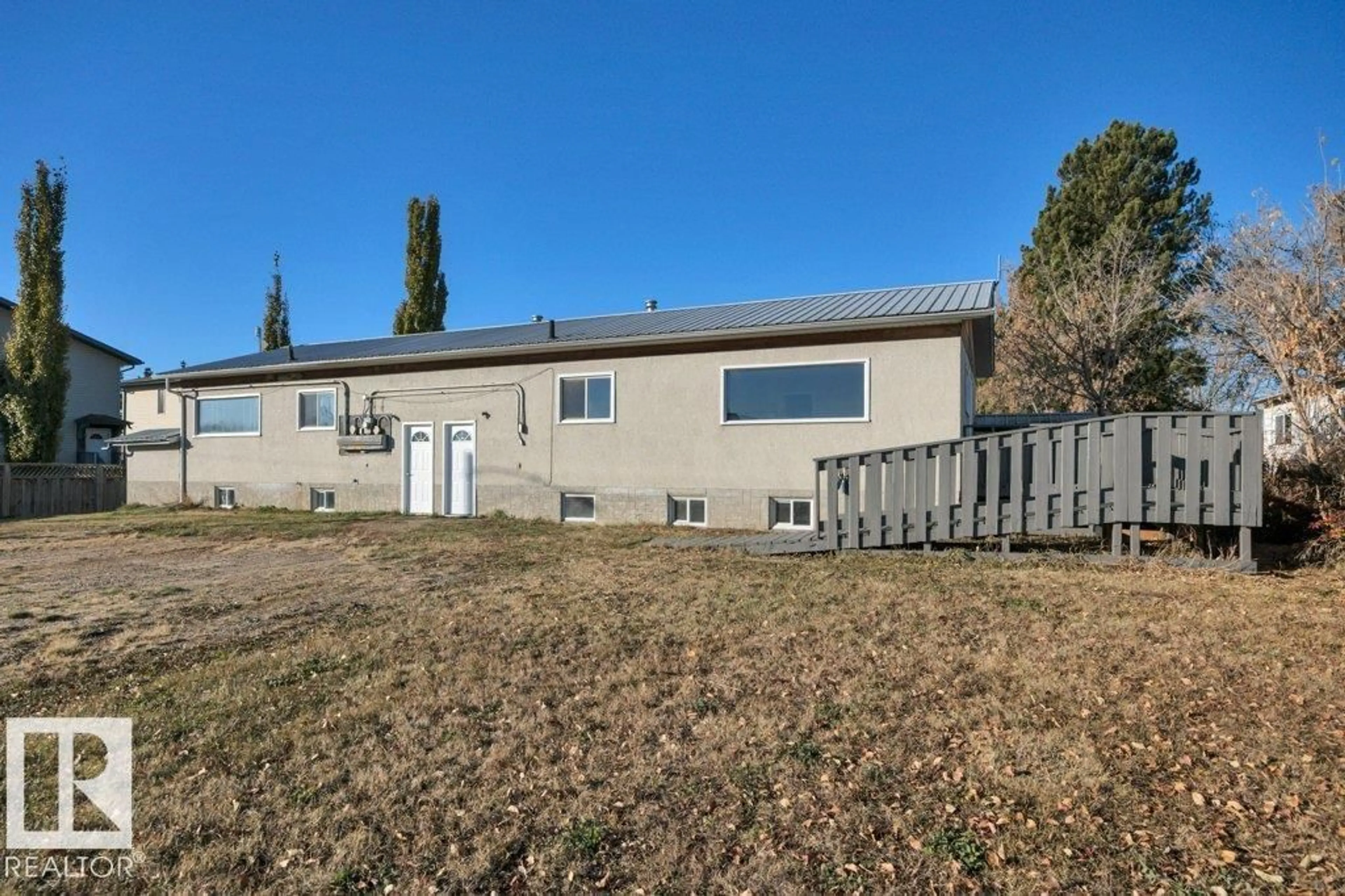 A pic from outside/outdoor area/front of a property/back of a property/a pic from drone, unknown for 5310 & 5312 50 ST, Thorsby Alberta T0C2P0