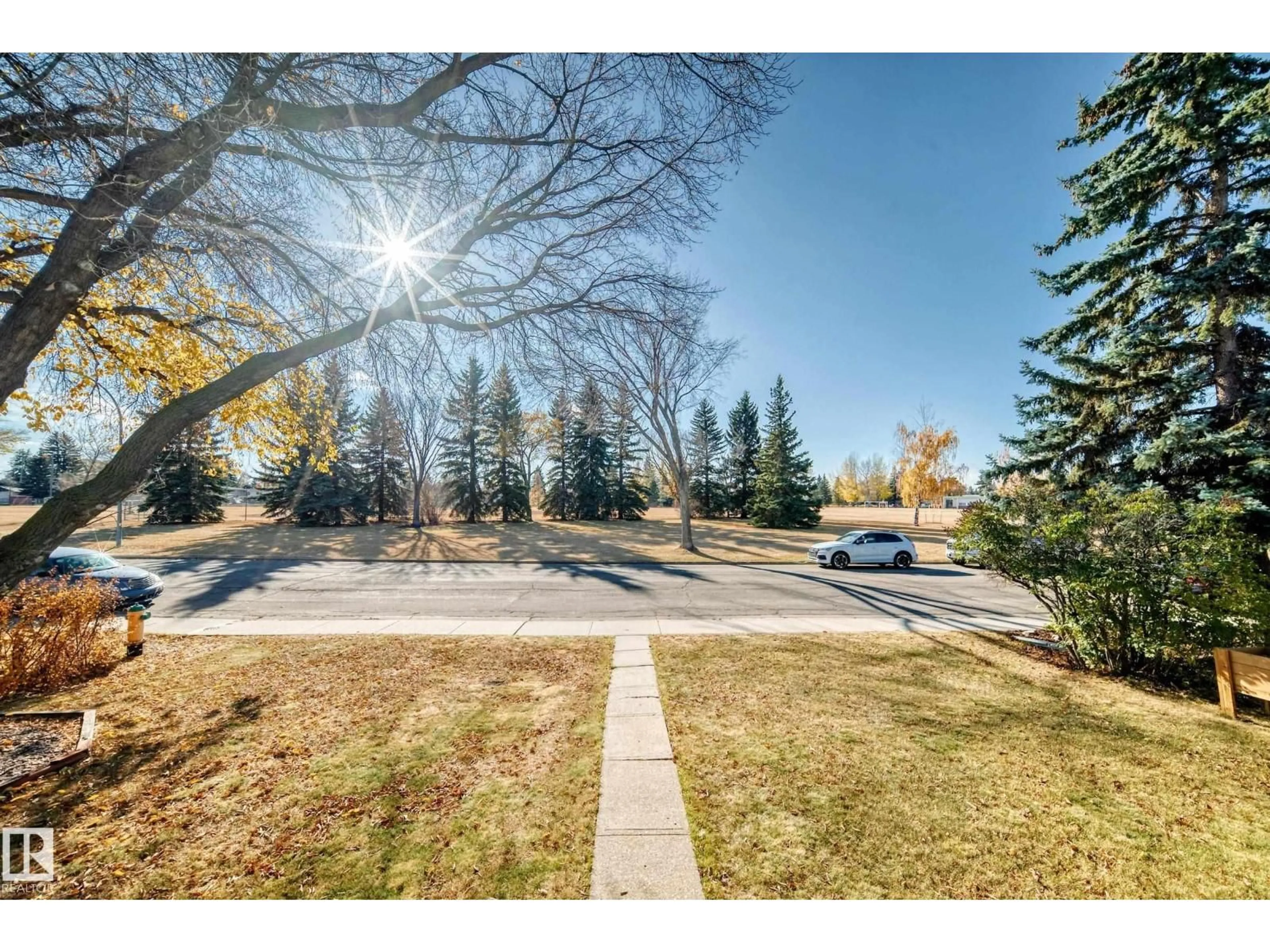 A pic from outside/outdoor area/front of a property/back of a property/a pic from drone, street for 15620 81 AV, Edmonton Alberta T5R3P4