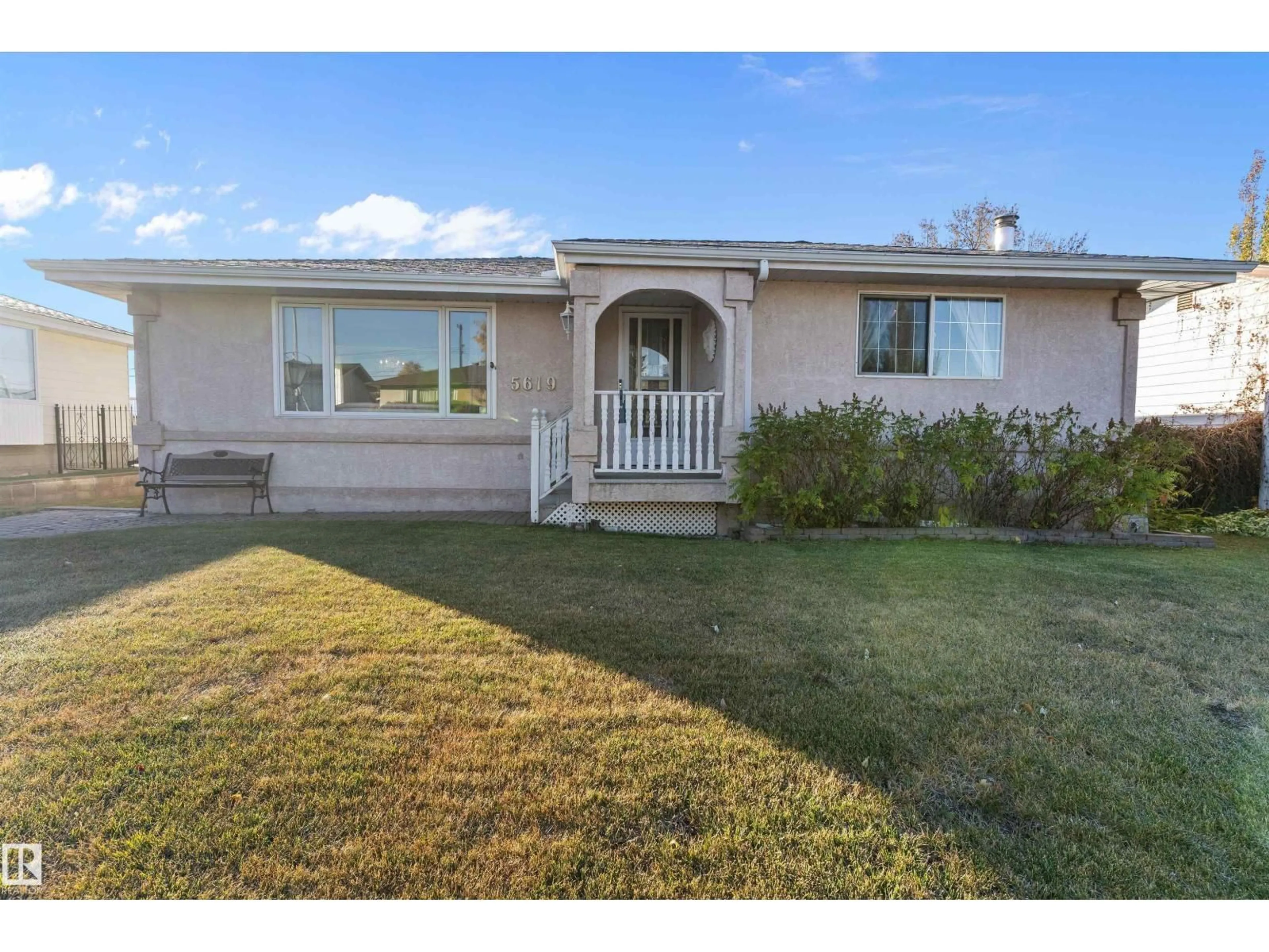 Home with vinyl exterior material, street for 5619 140A AV, Edmonton Alberta T5A1H4