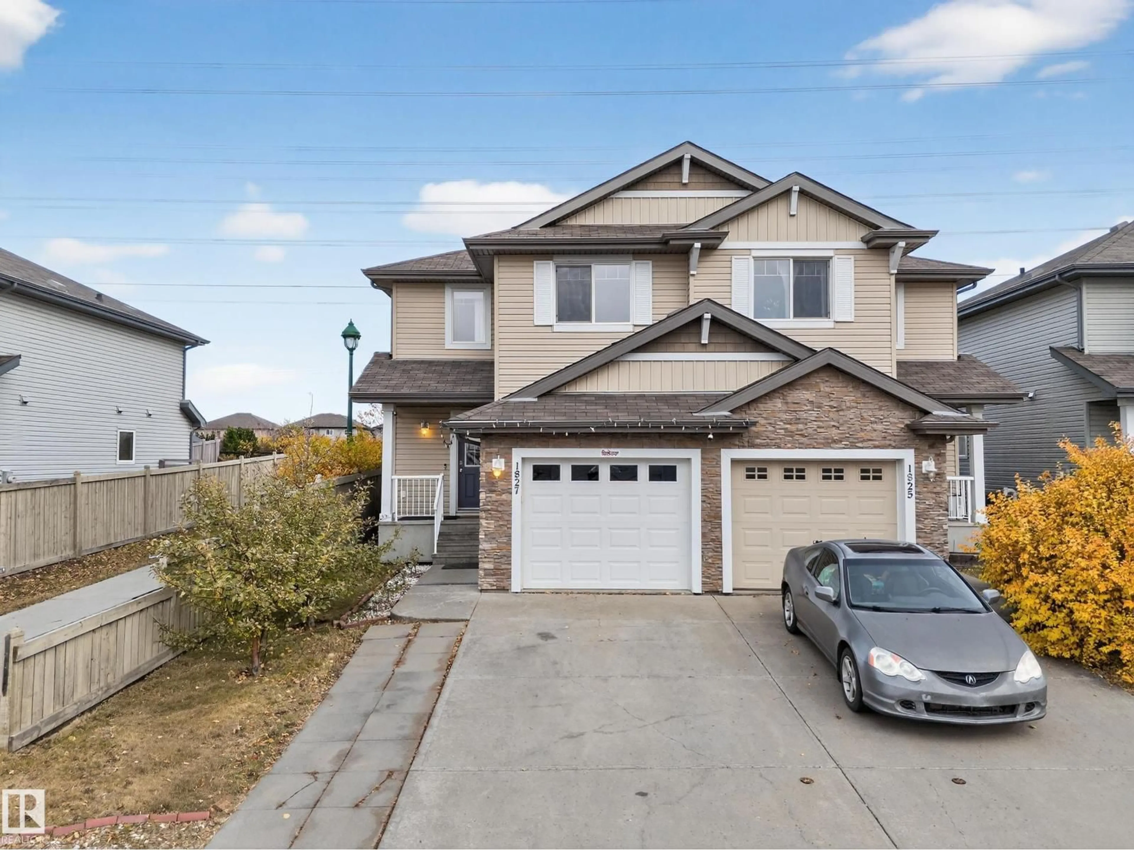 Home with vinyl exterior material, street for NW - 1827 28 ST, Edmonton Alberta T6T0N8