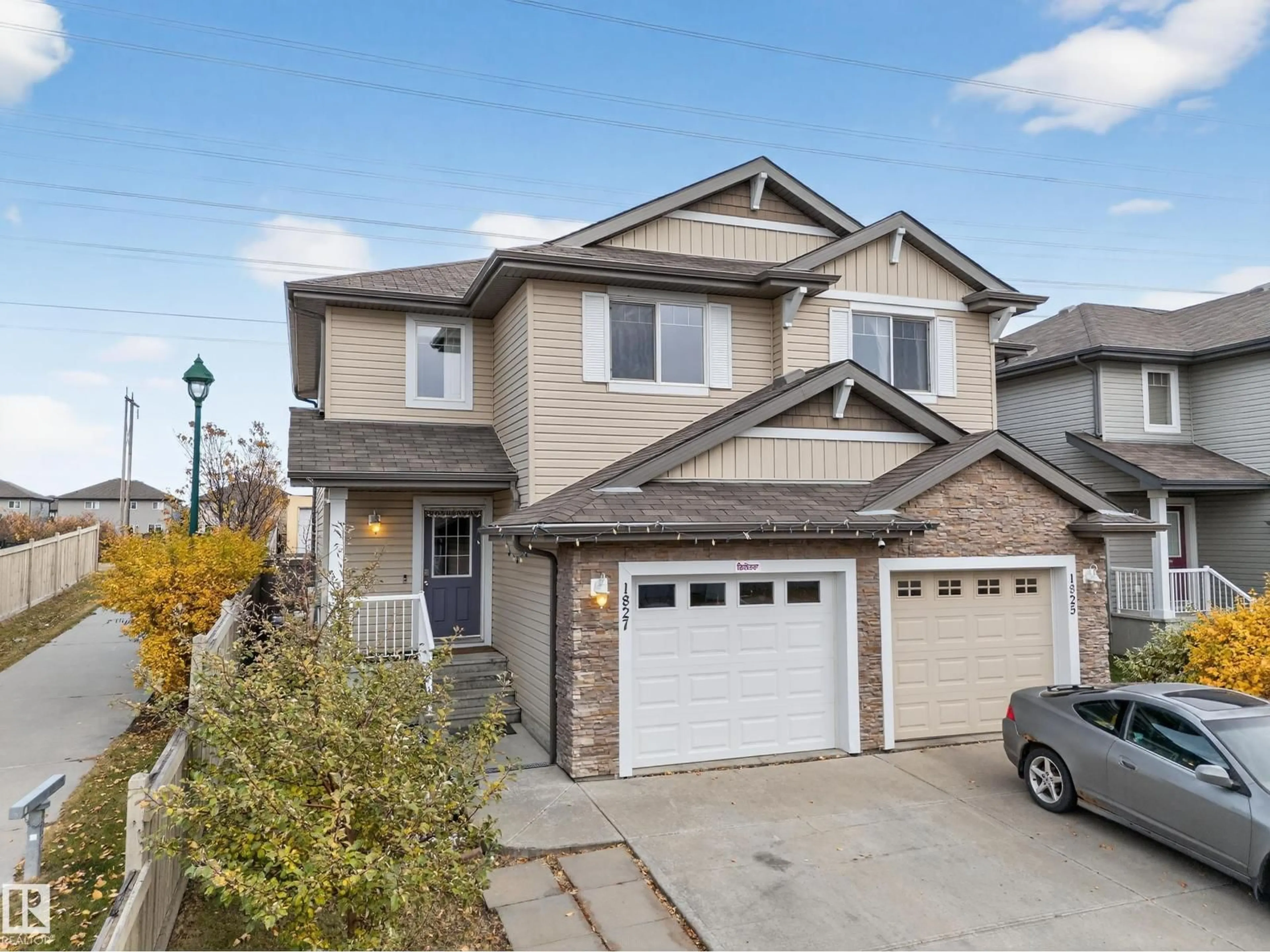 Home with vinyl exterior material, street for NW - 1827 28 ST, Edmonton Alberta T6T0N8