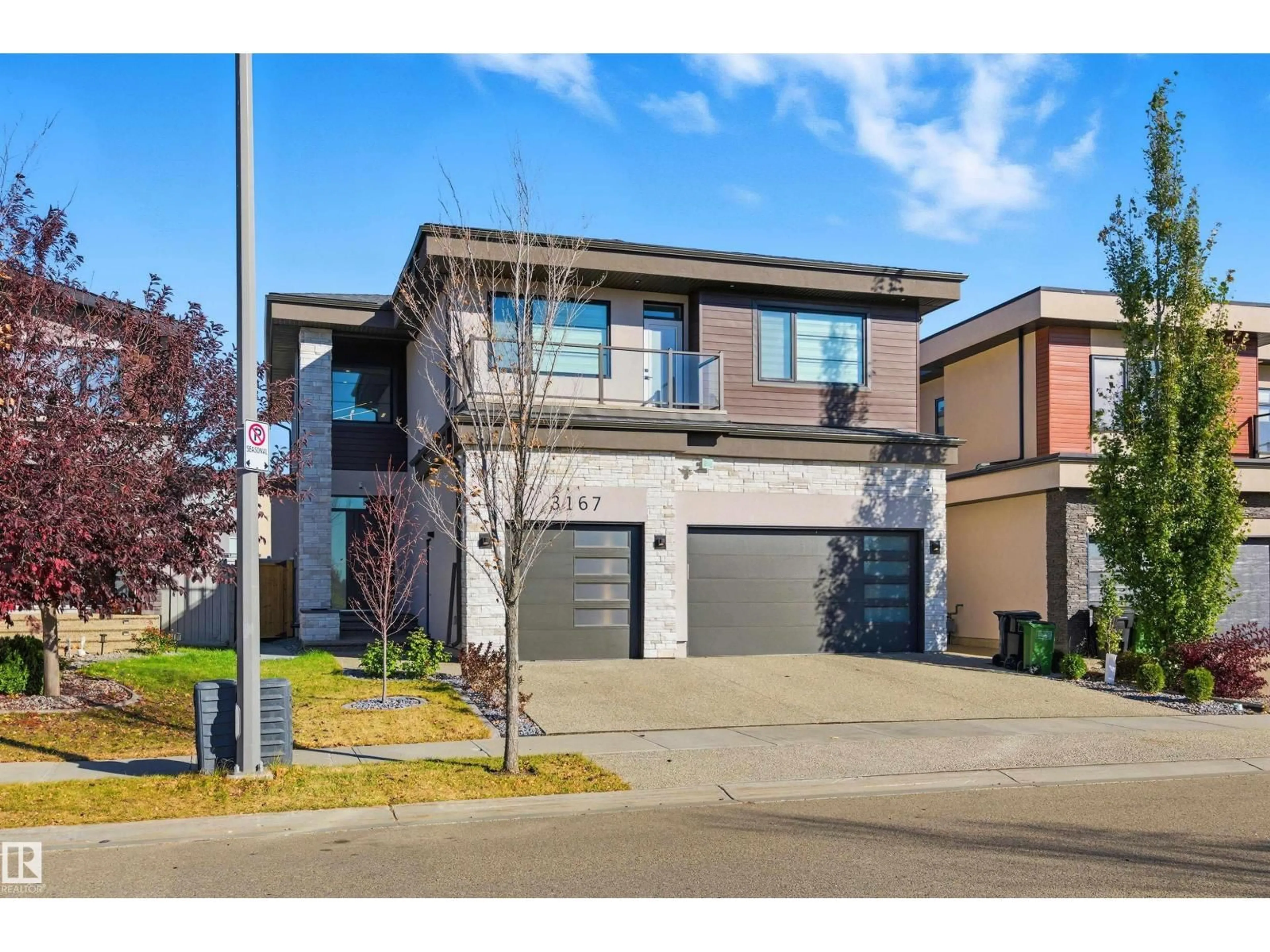 Home with brick exterior material, street for 3167 CAMERON HEIGHTS WY, Edmonton Alberta T6M0S5