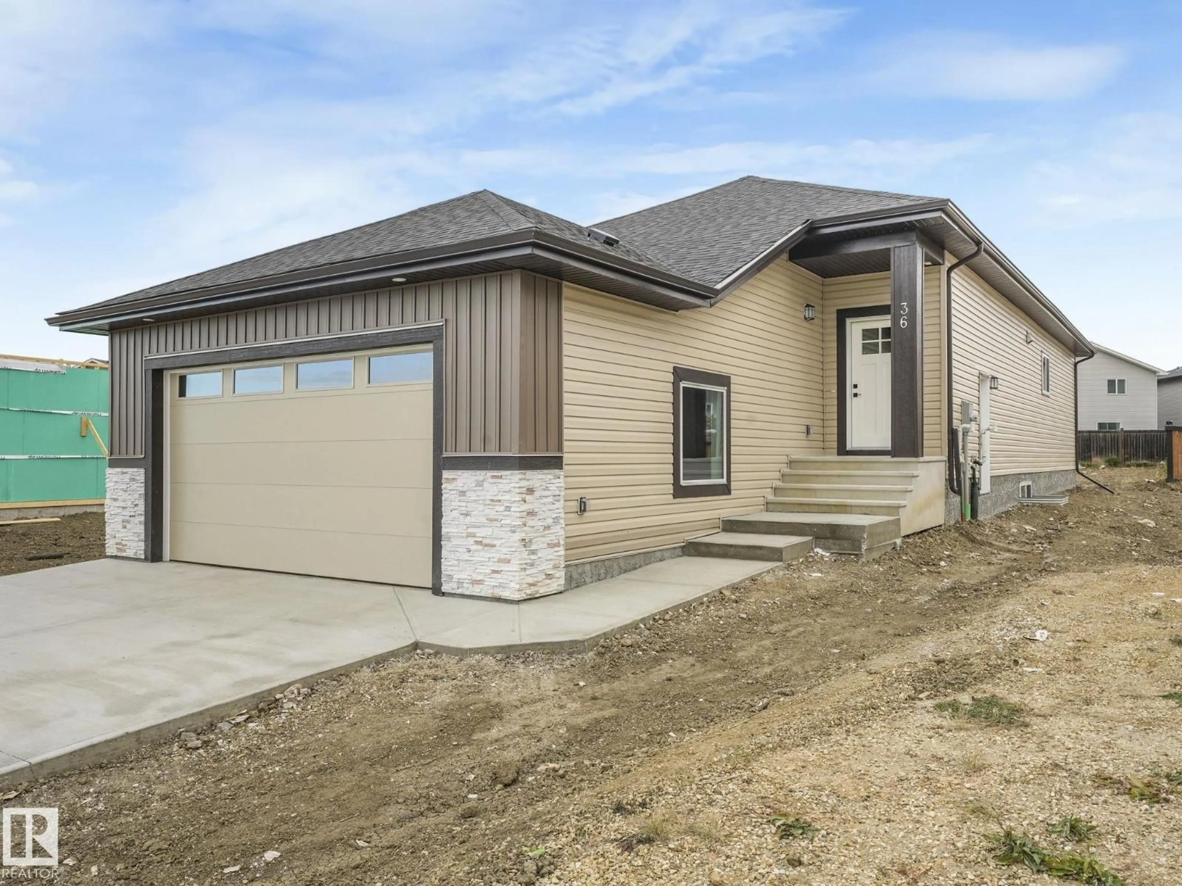Home with brick exterior material, street for 36 DALQUIST BAY, Leduc Alberta T9E1N7