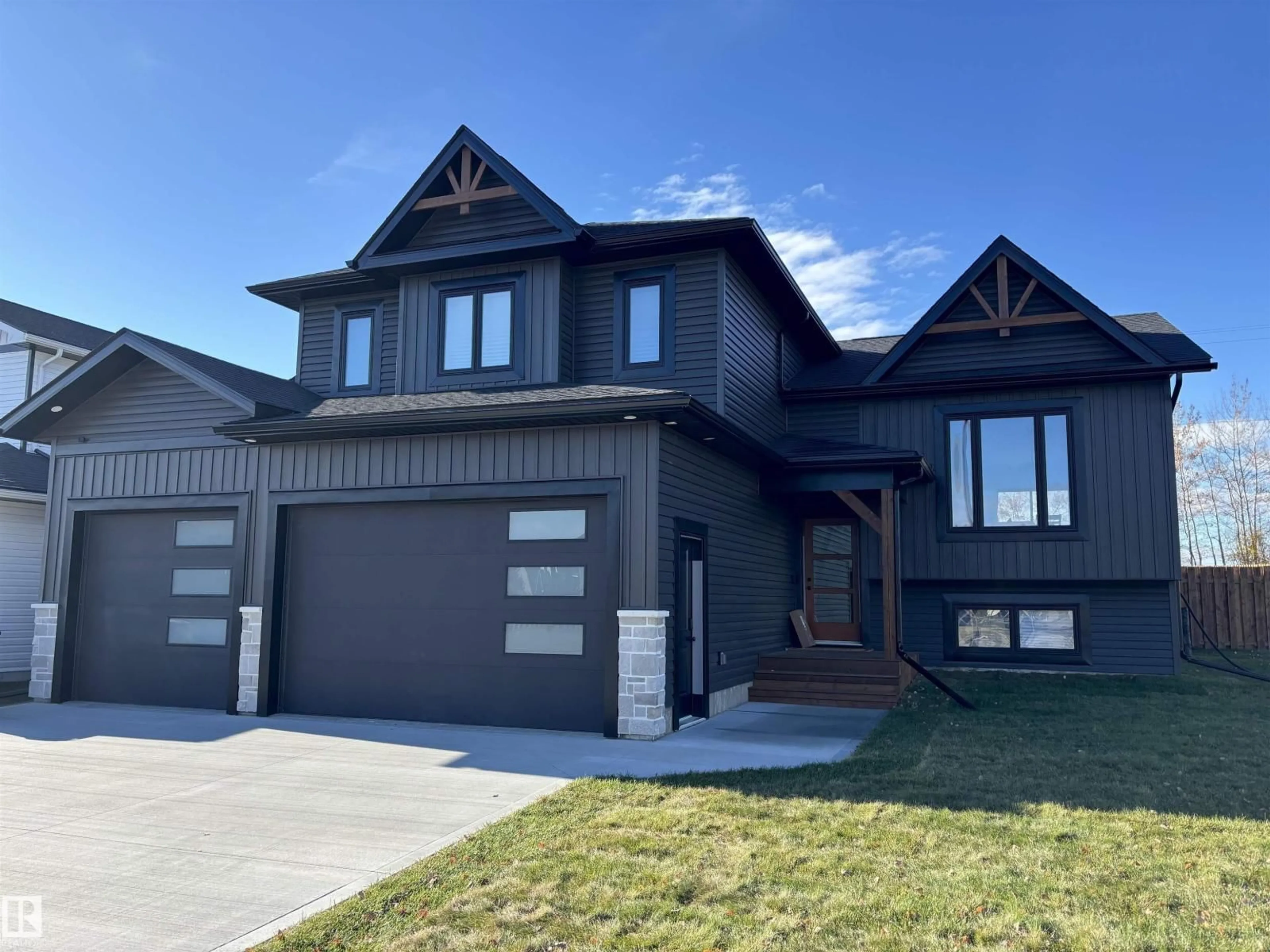 Home with vinyl exterior material, street for 63212 RANGE ROAD 423, Rural Bonnyville M.D. Alberta T9M1P1