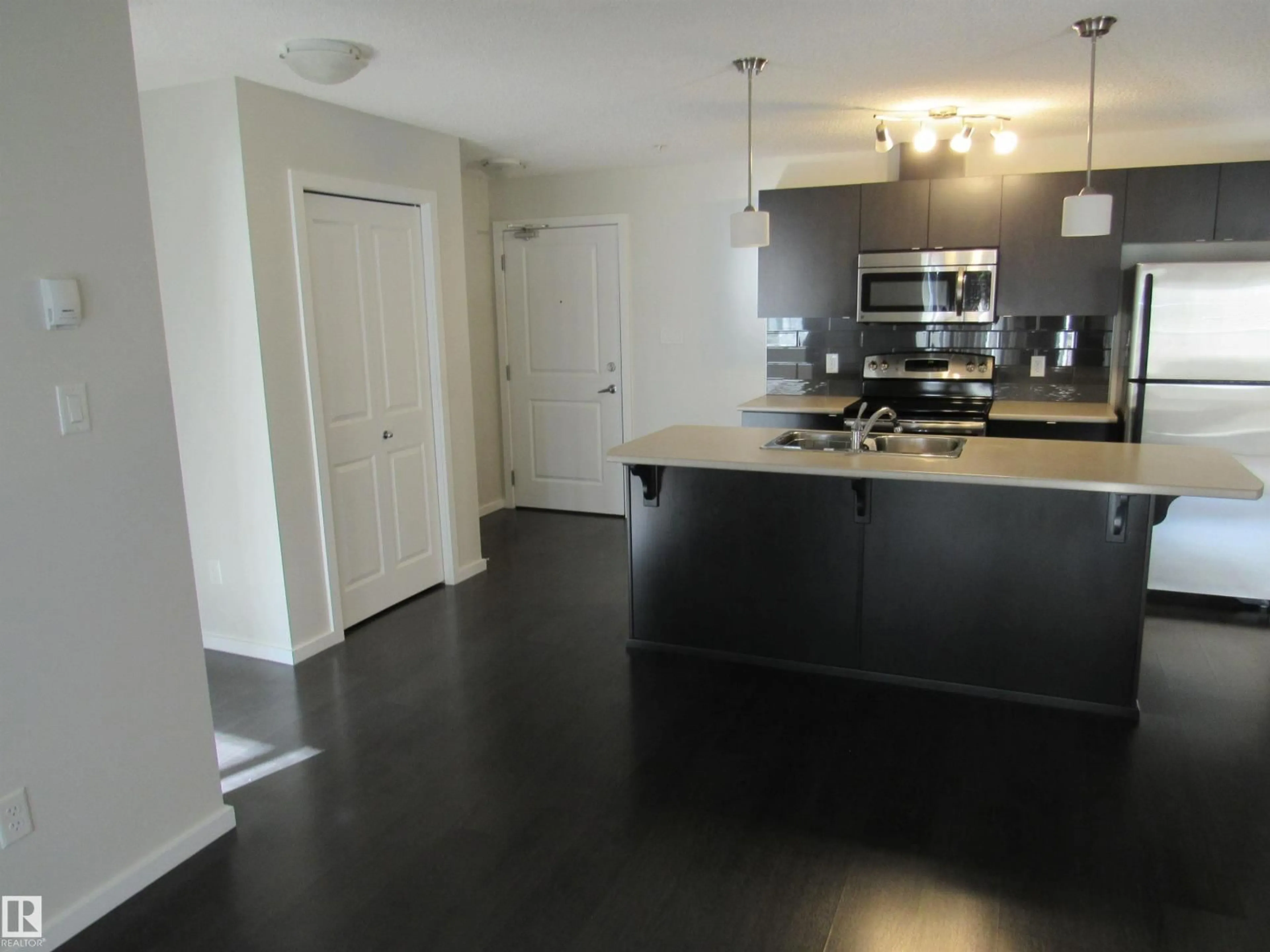 Open concept kitchen, unknown for #234 - 504 ALBANY WY, Edmonton Alberta T6V0L2