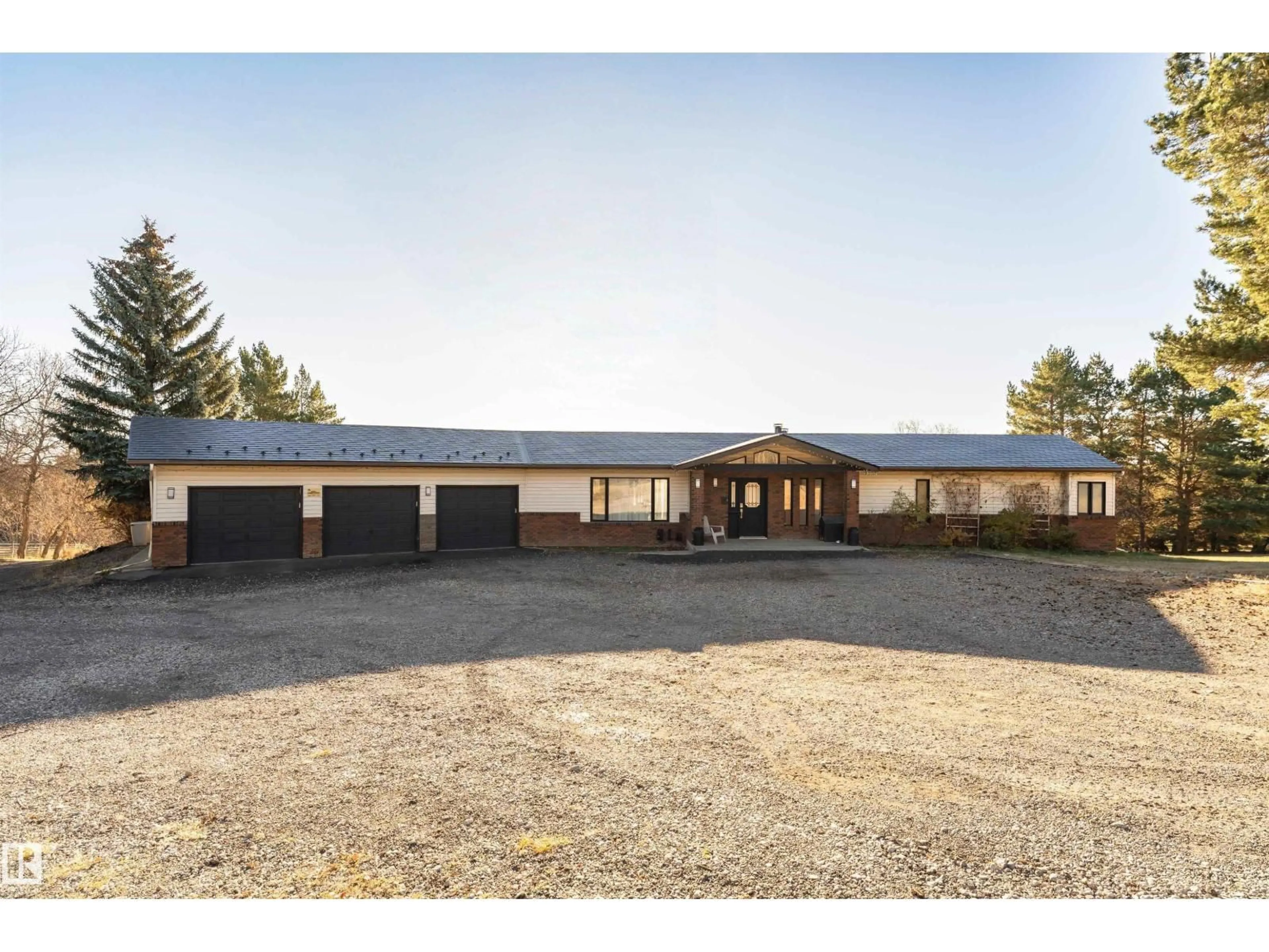 A pic from outside/outdoor area/front of a property/back of a property/a pic from drone, building for 21 - 55517 RR 240, Rural Sturgeon County Alberta T5E5S7