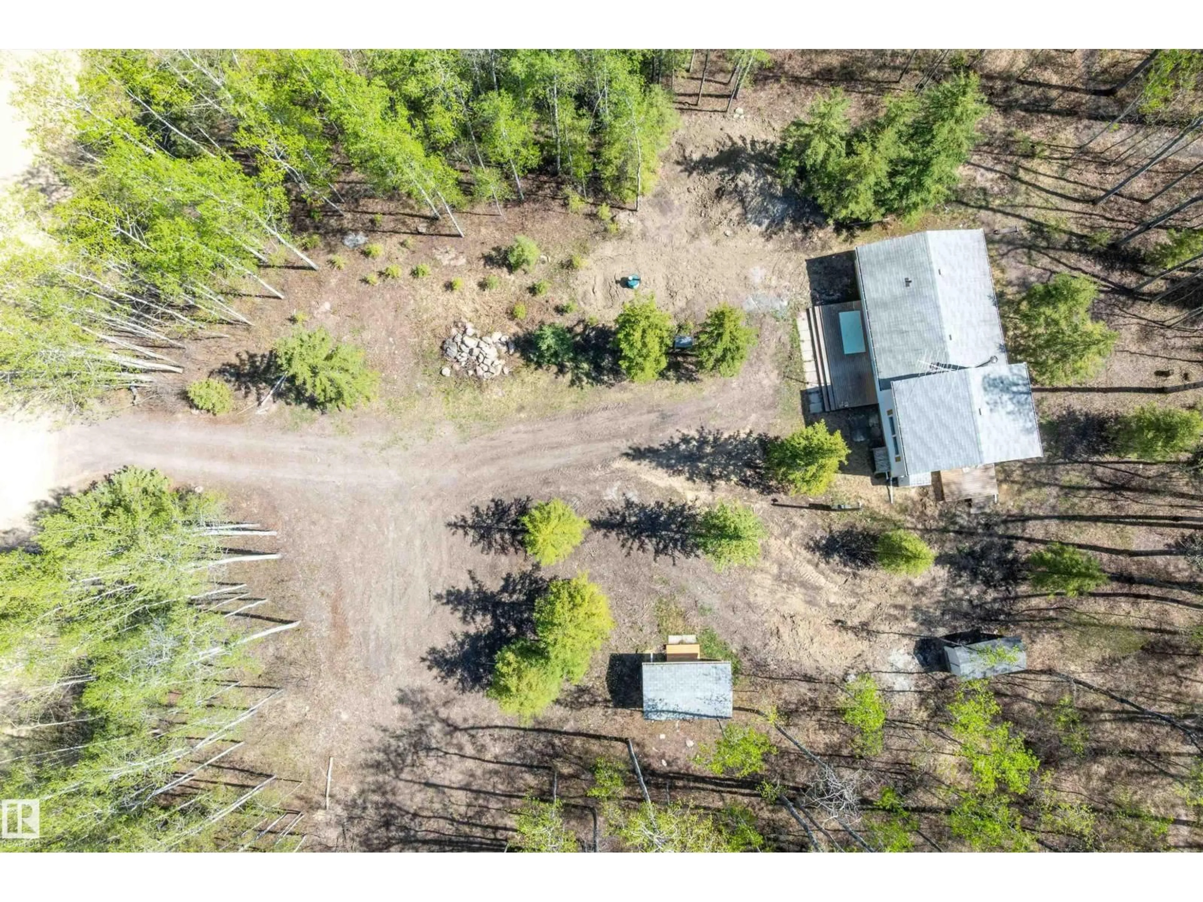 A pic from outside/outdoor area/front of a property/back of a property/a pic from drone, forest/trees view for 274022 TWP ROAD 480, Rural Wetaskiwin County Alberta T0C2P0