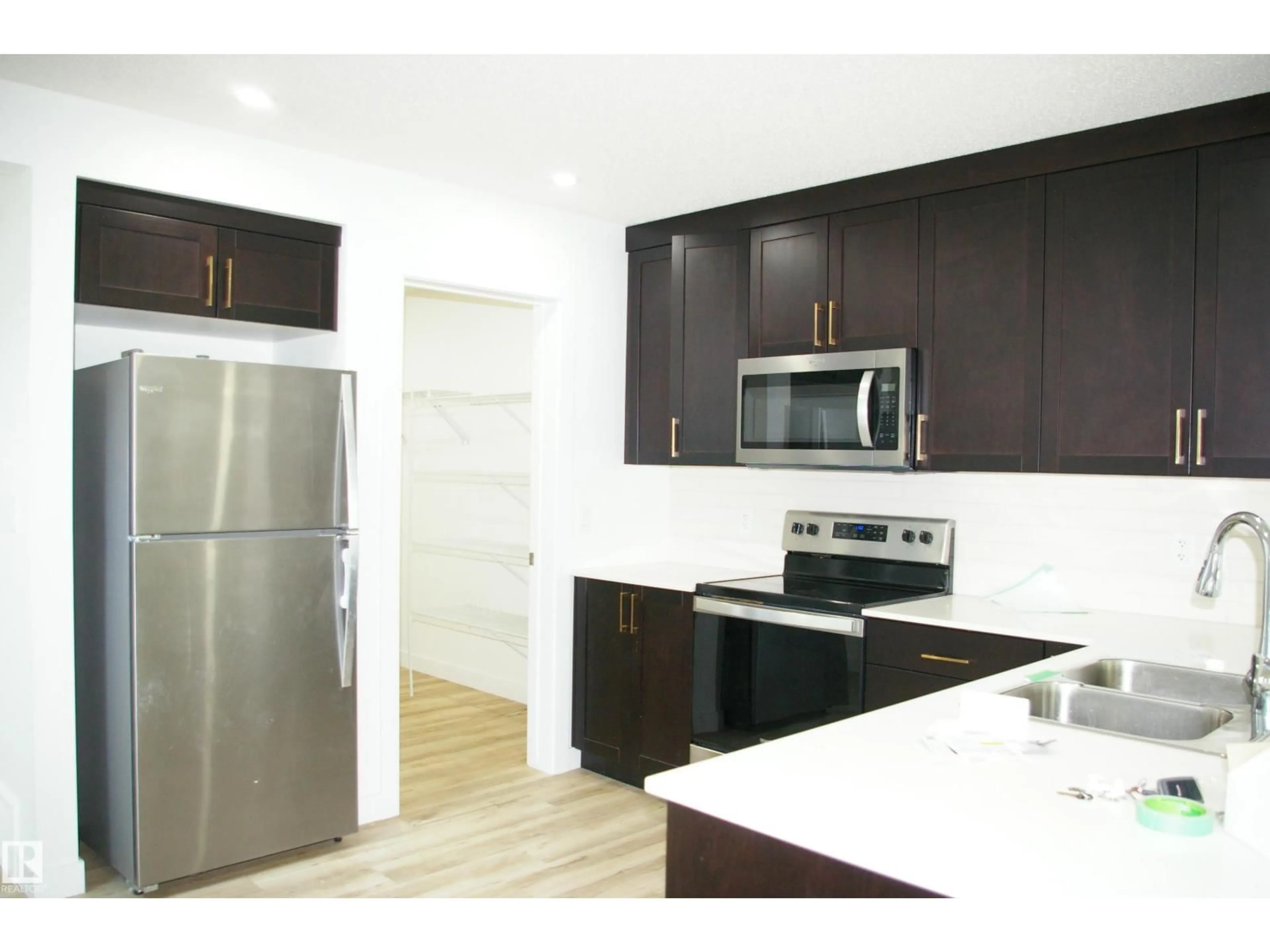 Standard kitchen, wood/laminate floor for 1303 ERKER CR, Edmonton Alberta T6M1N4