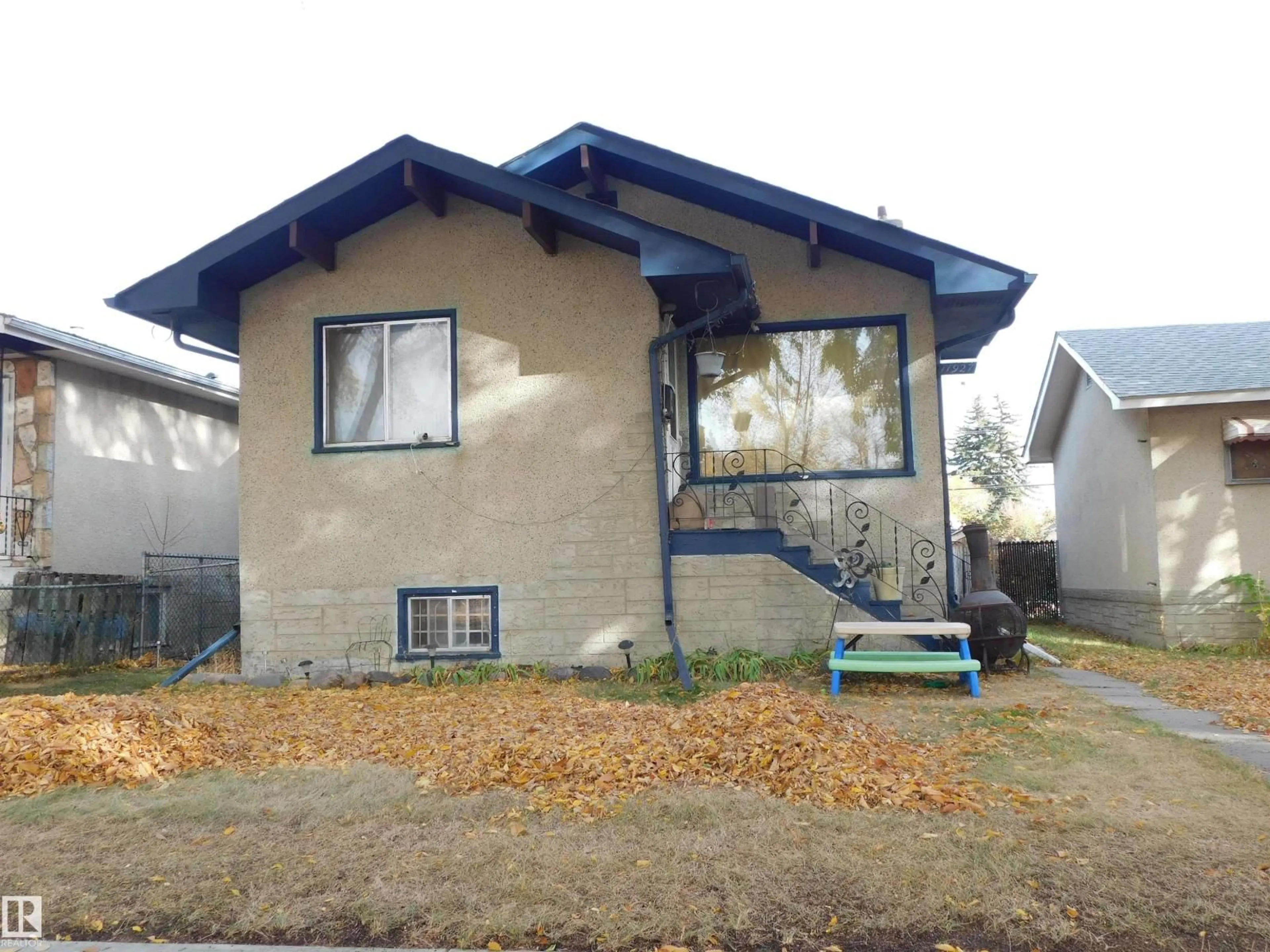 Home with vinyl exterior material, building for NW - 11927 67 ST, Edmonton Alberta T5B1M2