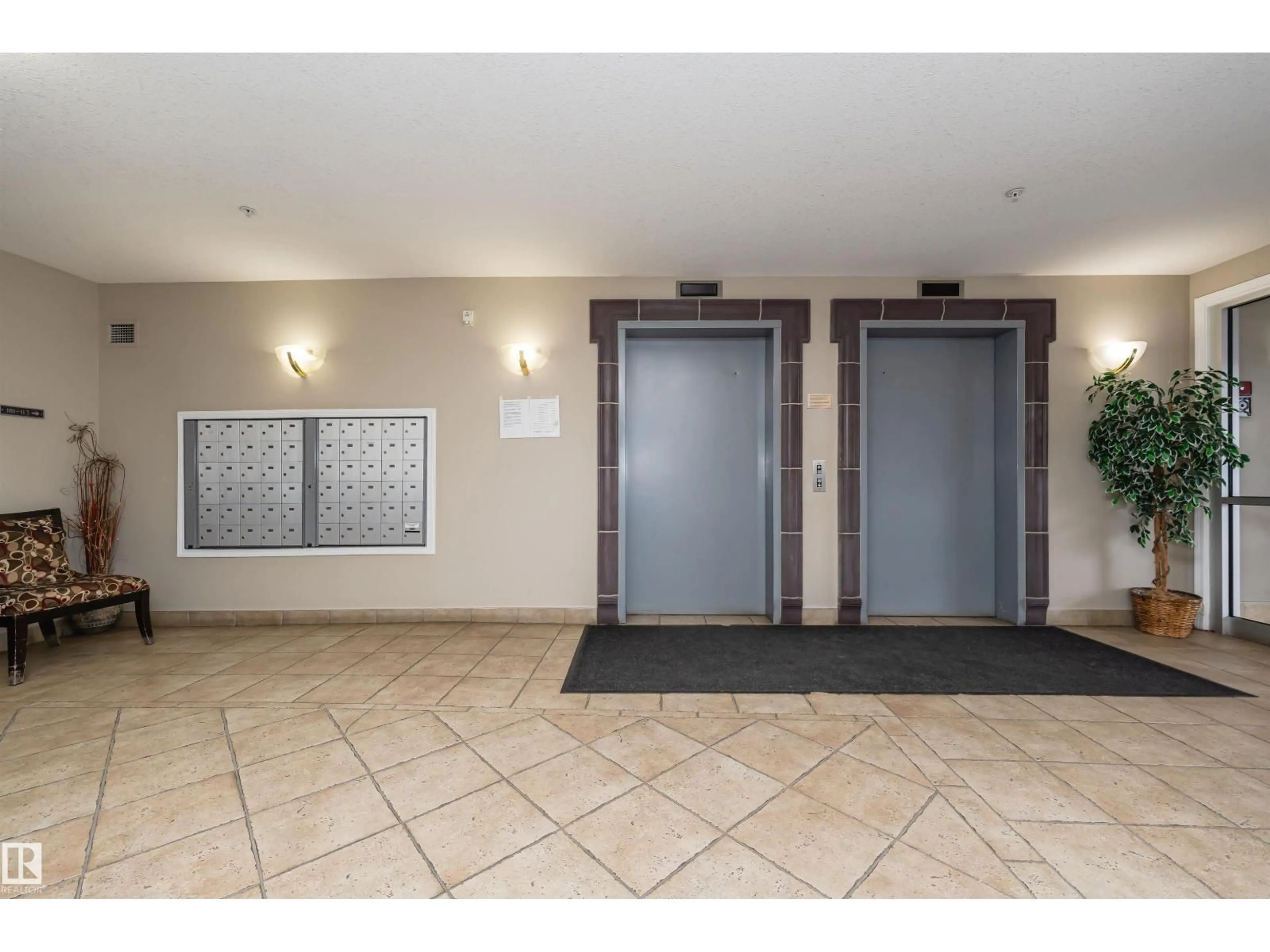 Indoor foyer for #104 - 237 YOUVILLE DR, Edmonton Alberta T6L7G2