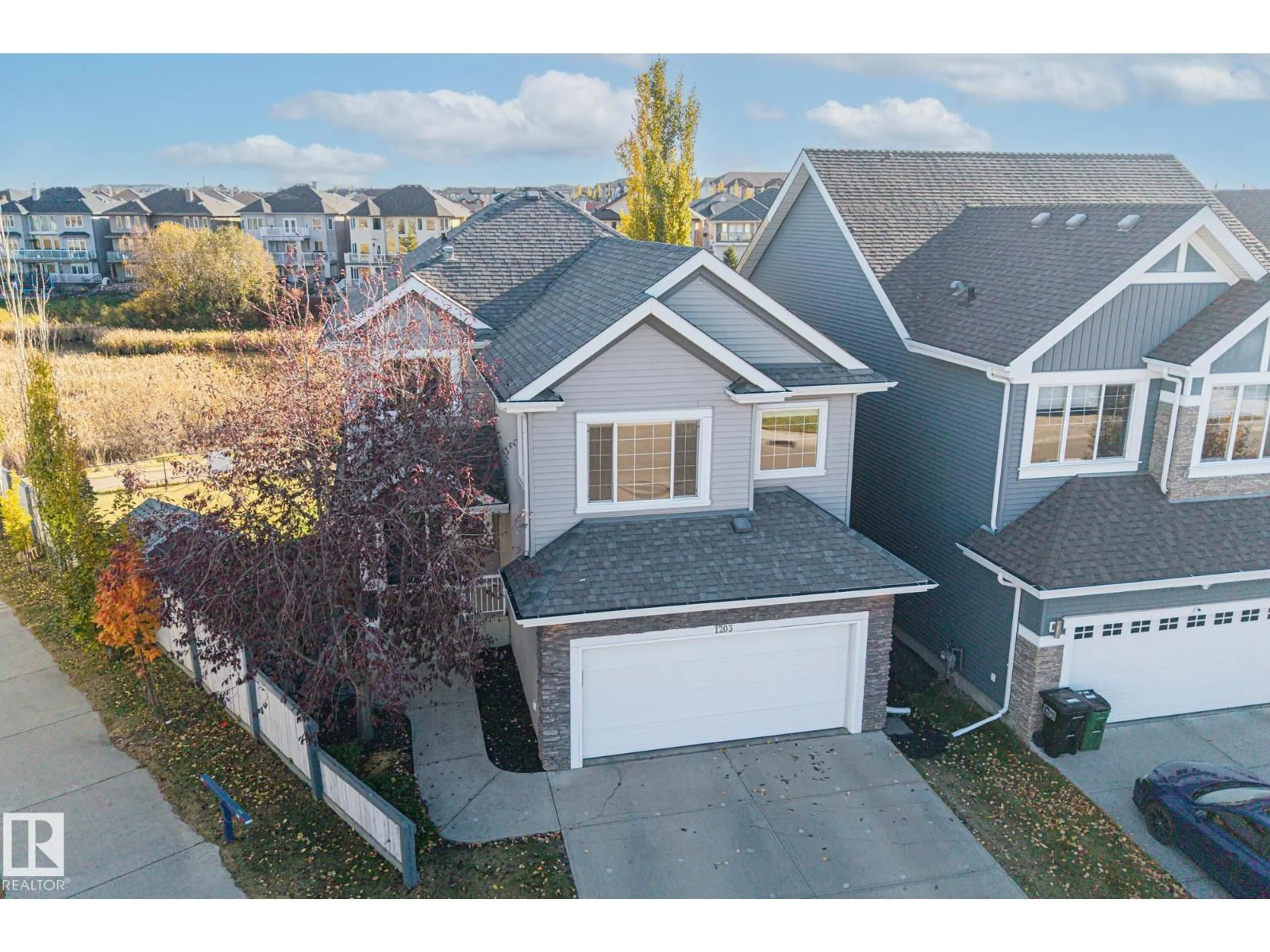 A pic from outside/outdoor area/front of a property/back of a property/a pic from drone, street for 1203 72 ST, Edmonton Alberta T6X0N8